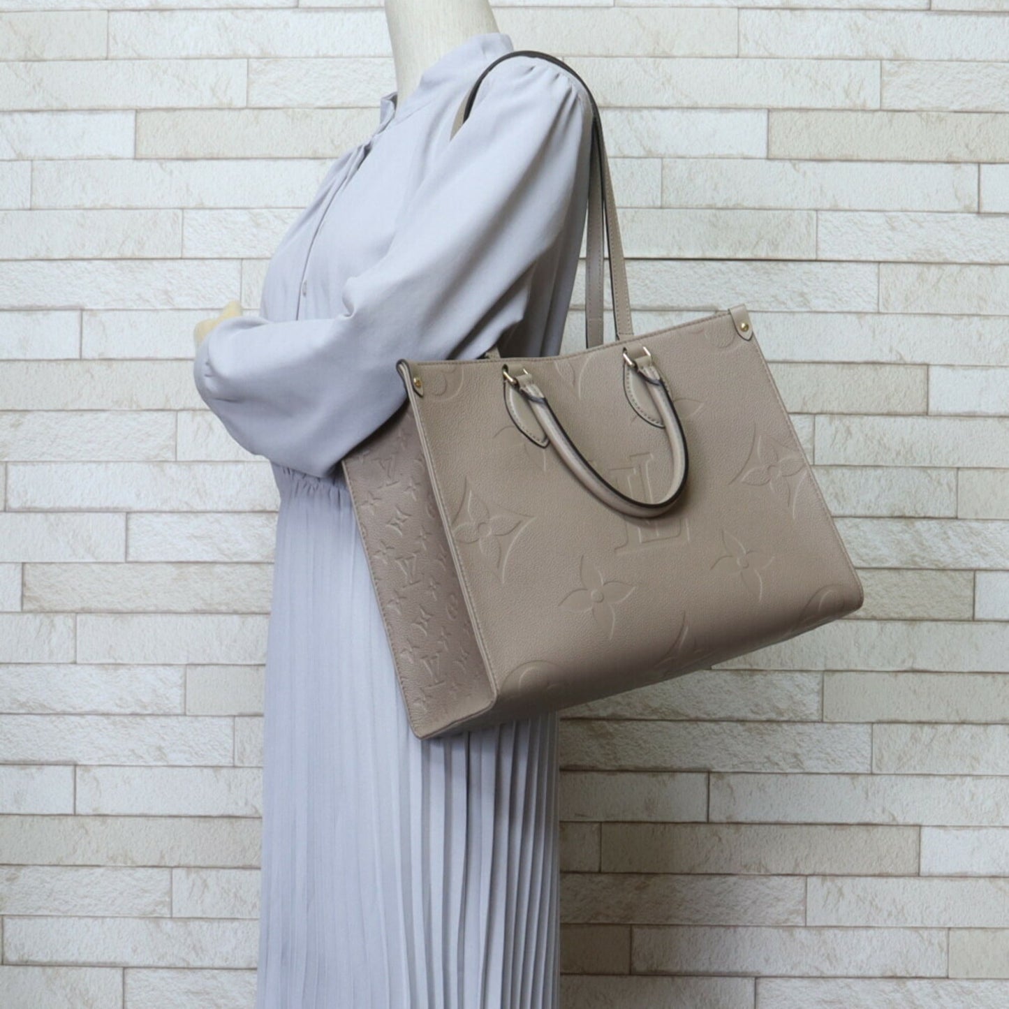 Louis Vuitton Monogram Empreinte Shoulder Bag