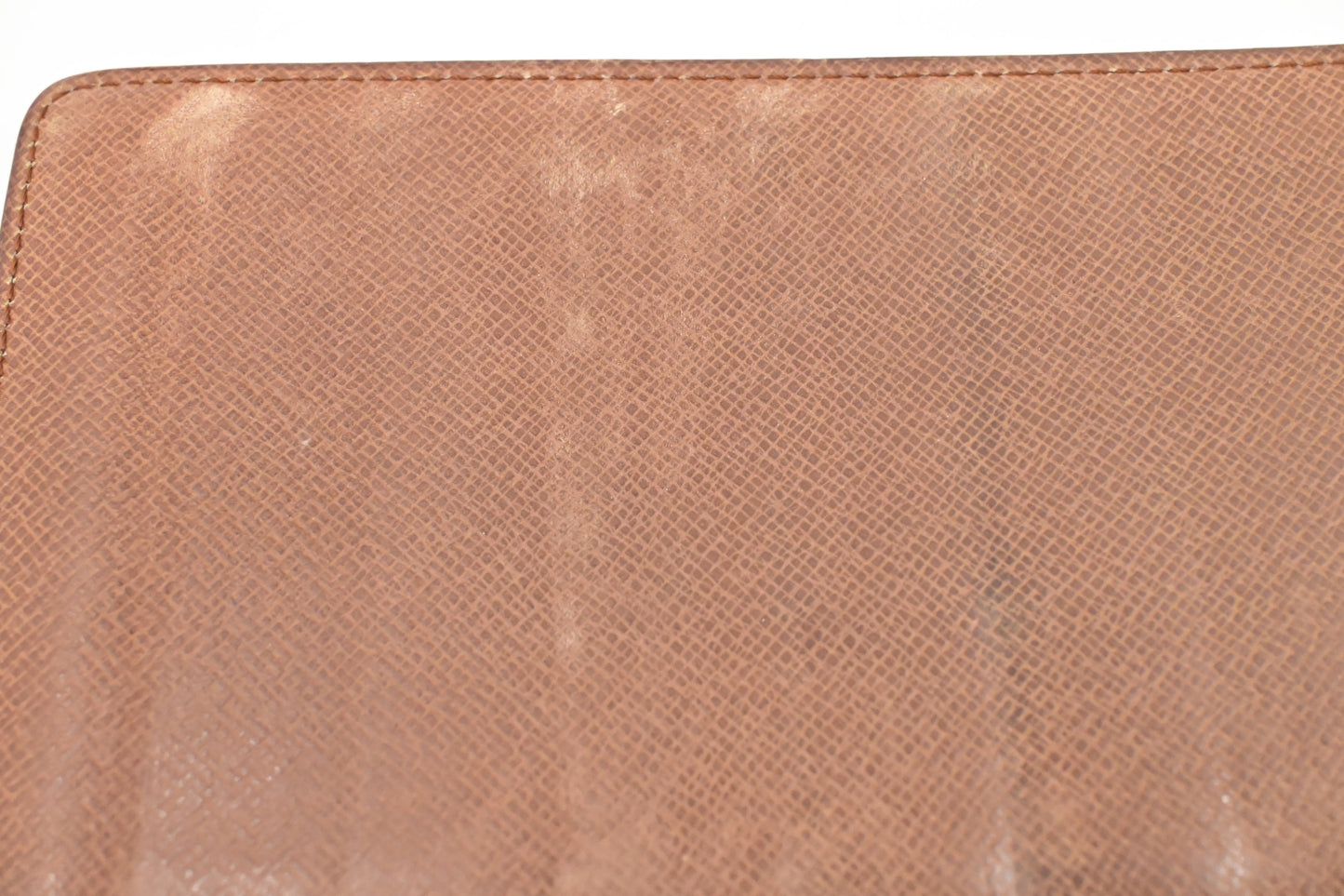 Louis Vuitton Vertical Bifold Wallet in Monogram Canvas