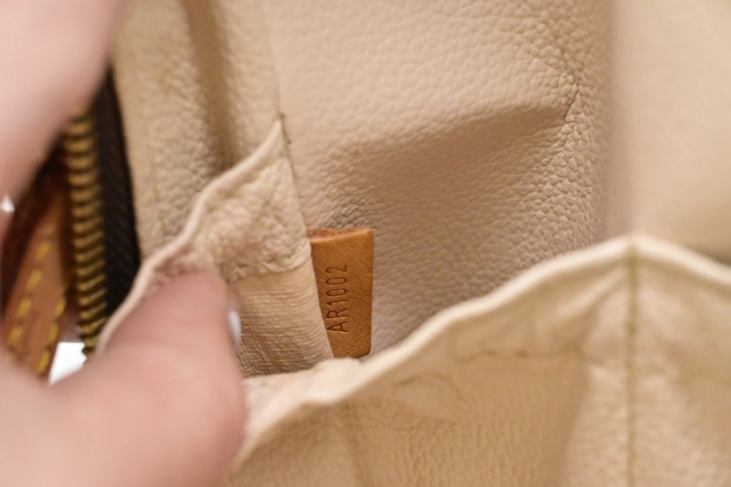 Louis Vuitton Spontini in Monogram Canvas