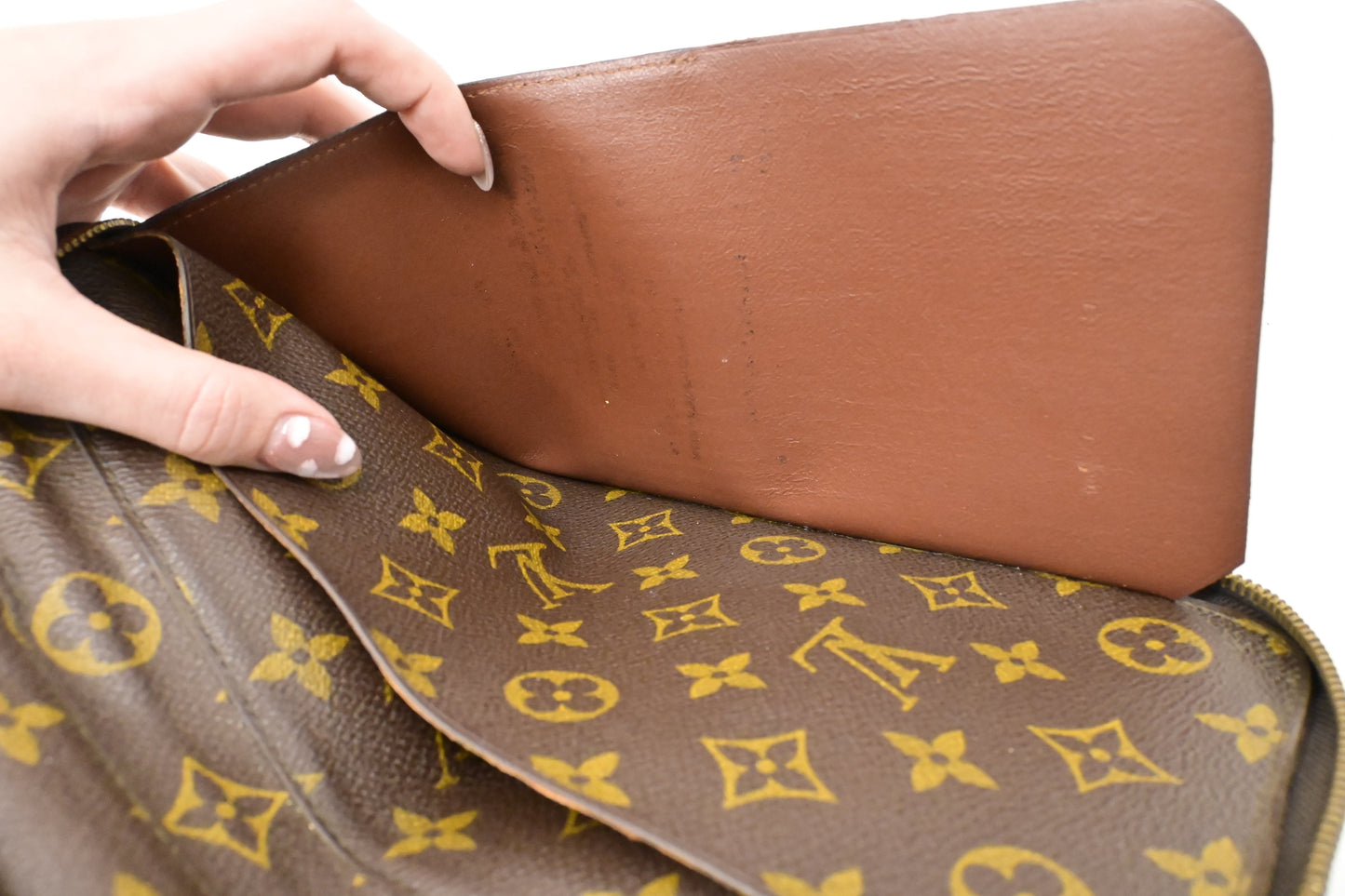 Louis Vuitton Poche Escapade in Monogram Canvas
