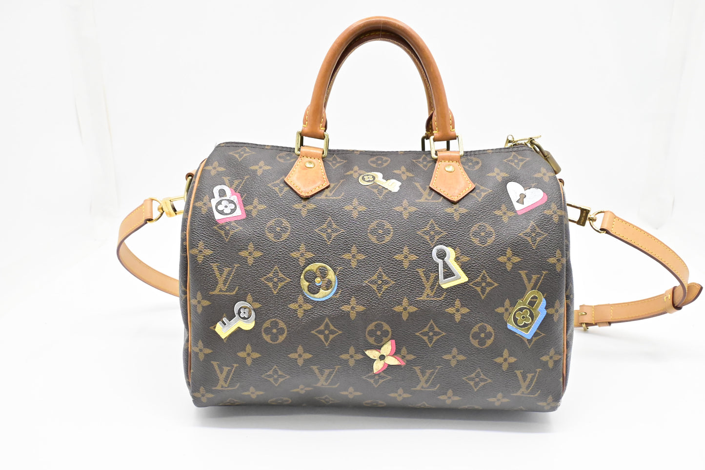 Louis Vuitton Speedy 30 Bandouliere in Love Lock Monogram Canvas