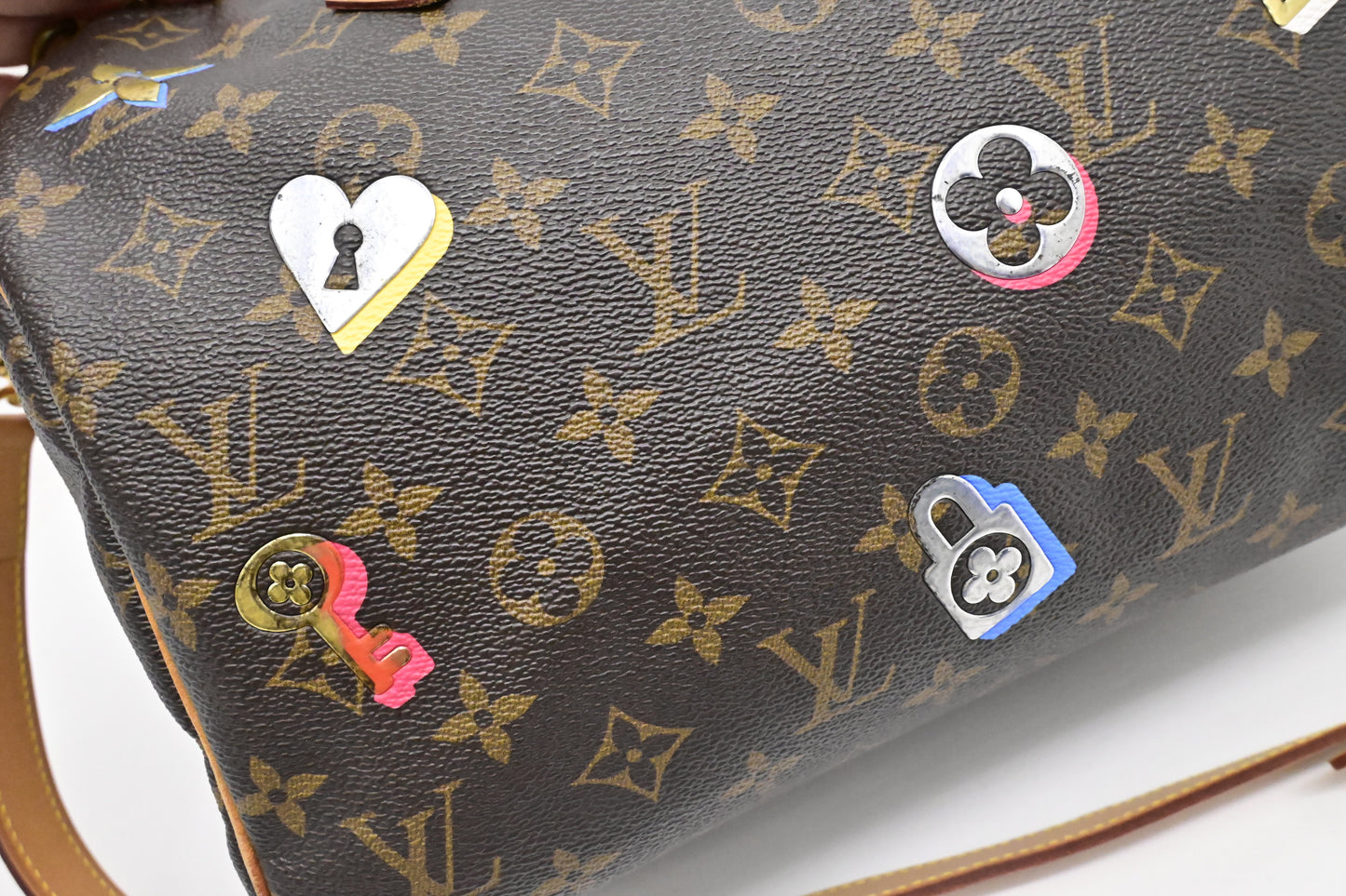 Louis Vuitton Speedy 30 Bandouliere in Love Lock Monogram Canvas