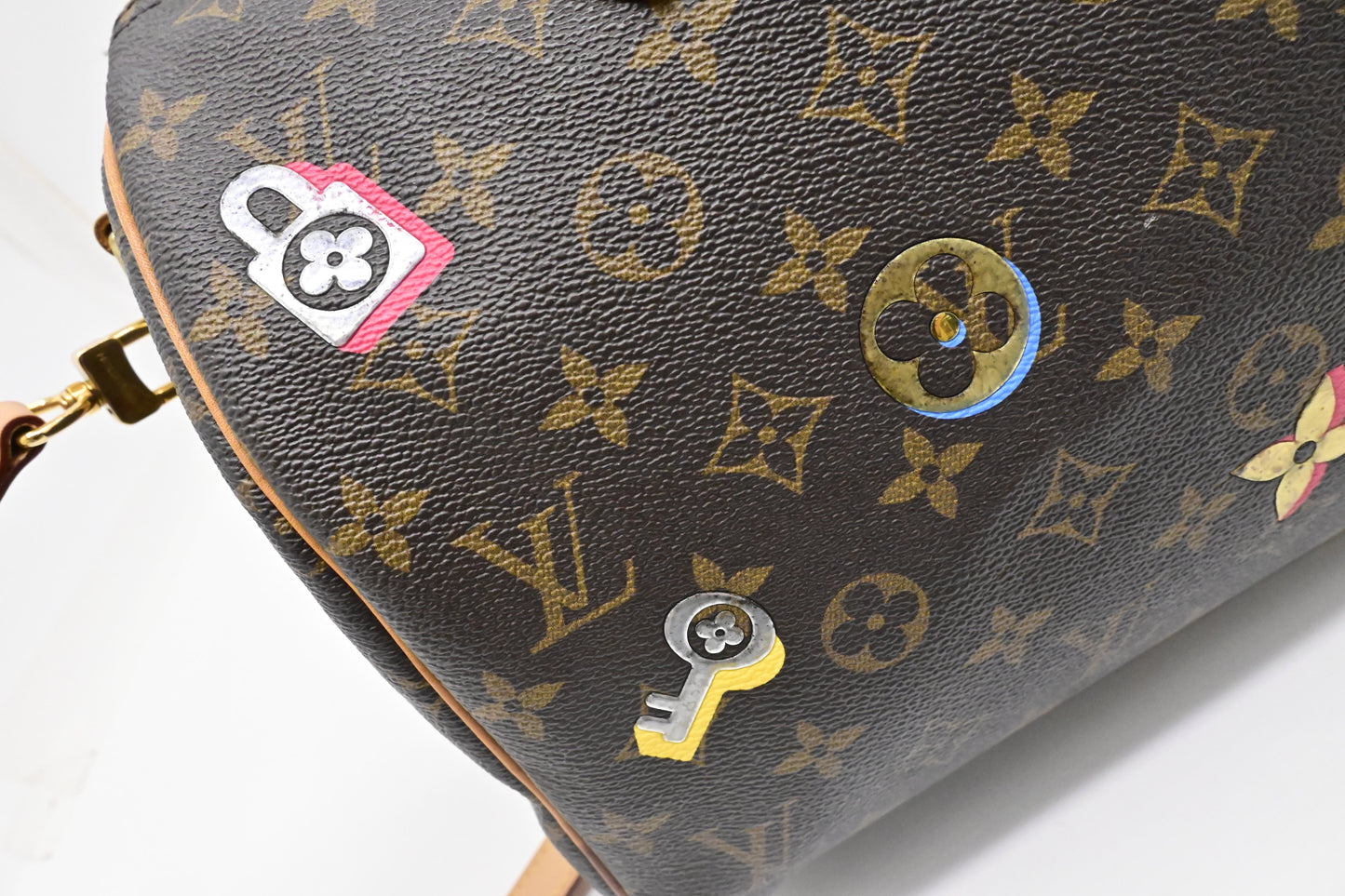 Louis Vuitton Speedy 30 Bandouliere in Love Lock Monogram Canvas