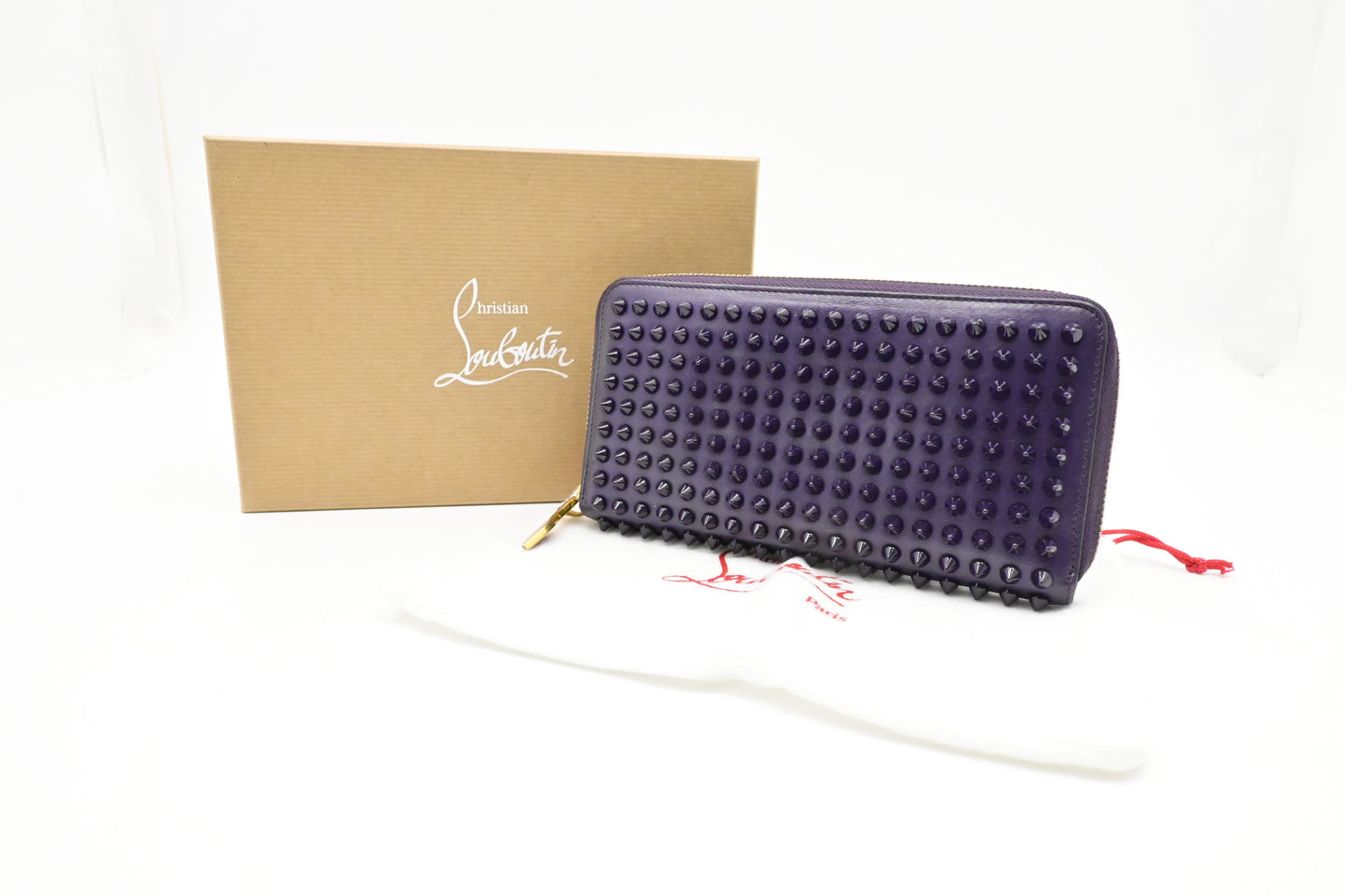 Louboutin Zippy Wallet in Spiked Purple Leather