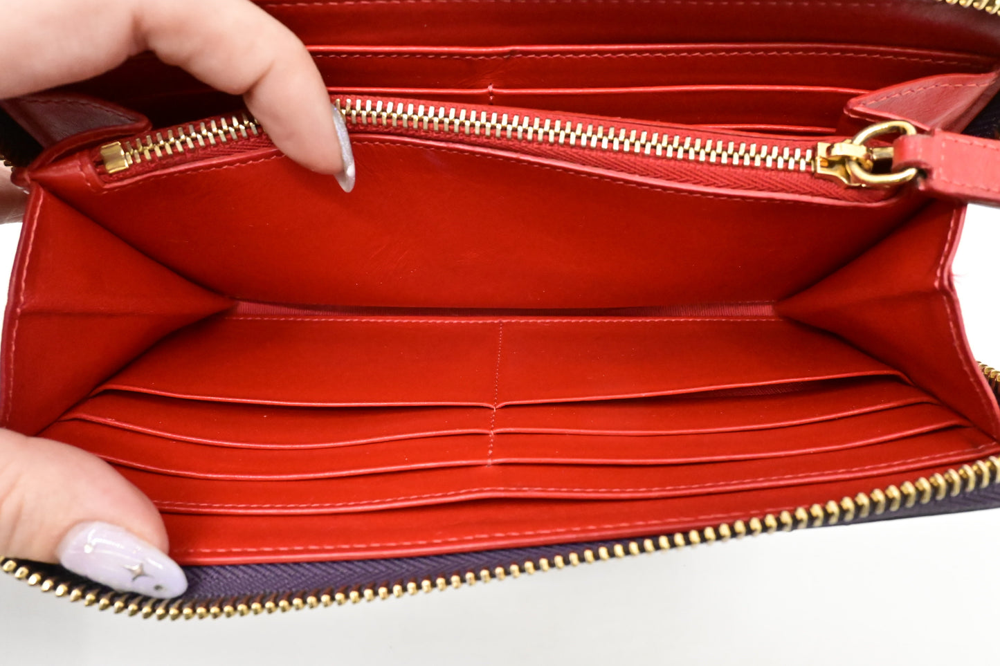Louboutin Zippy Wallet in Spiked Purple Leather