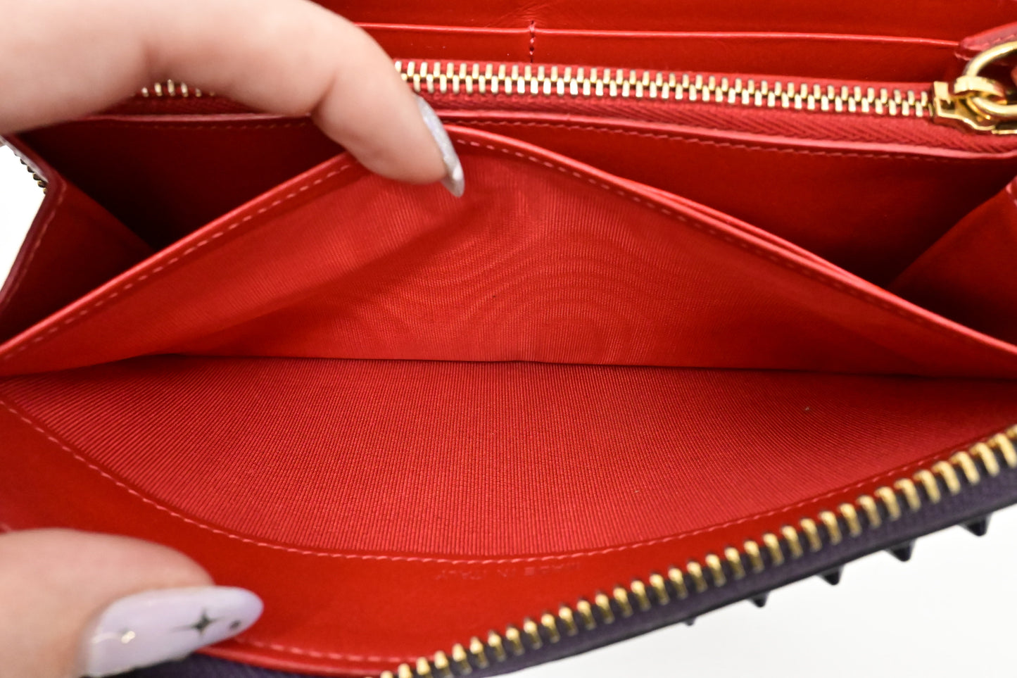 Louboutin Zippy Wallet in Spiked Purple Leather