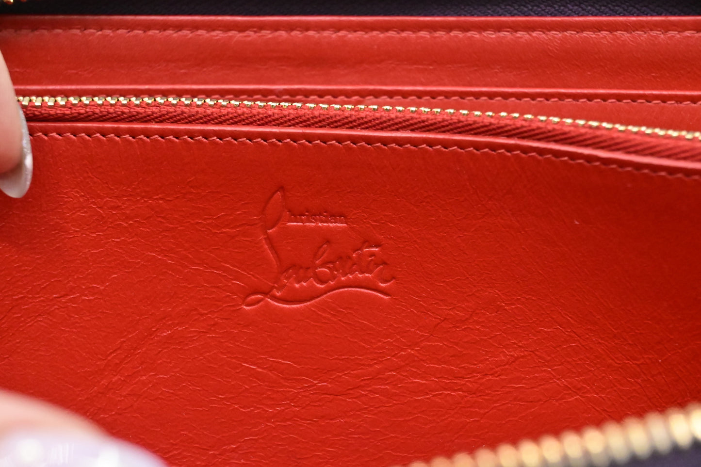 Louboutin Zippy Wallet in Spiked Purple Leather