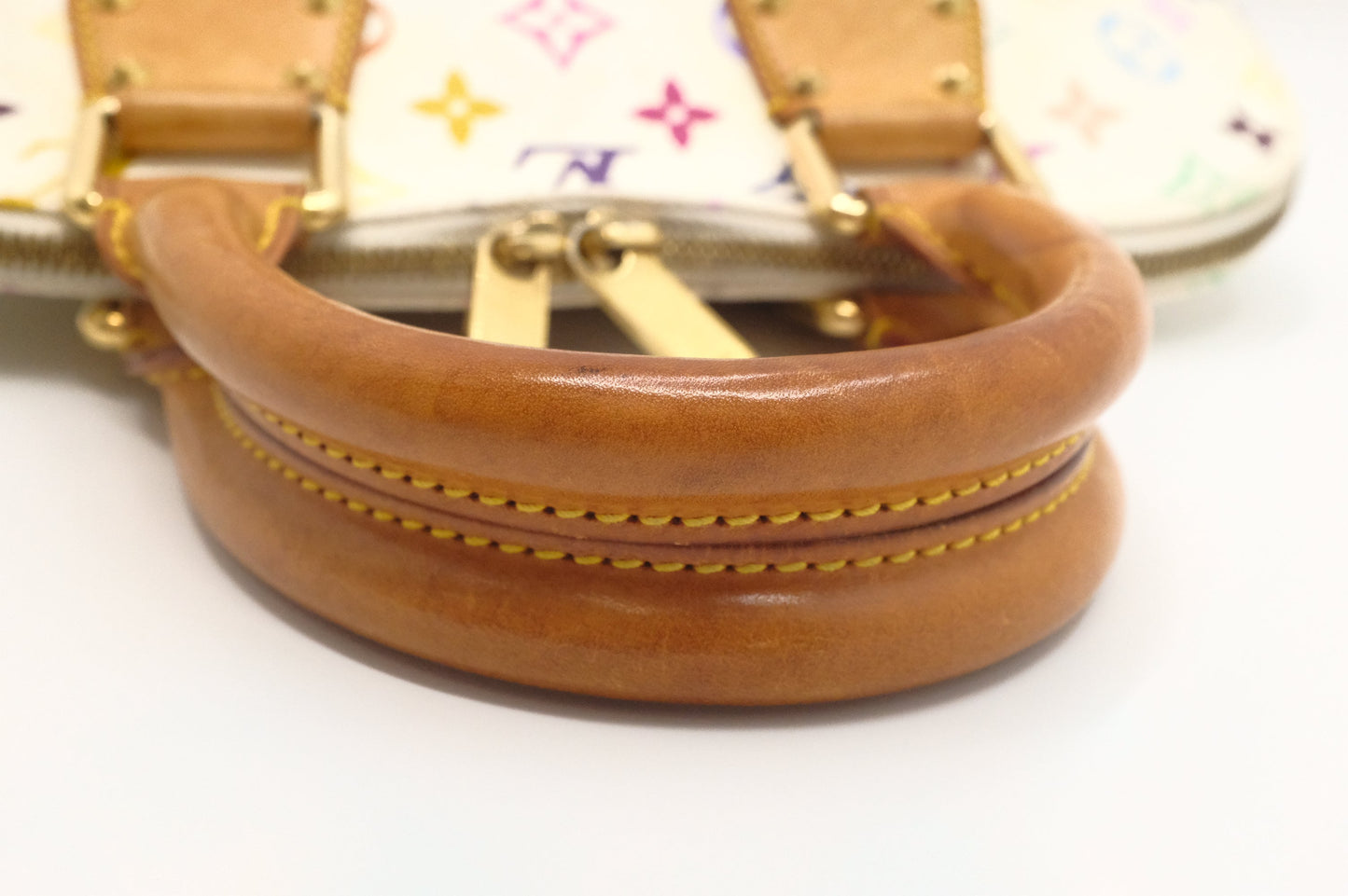 Louis Vuitton Alma PM in White Multicolor Monogram Canvas