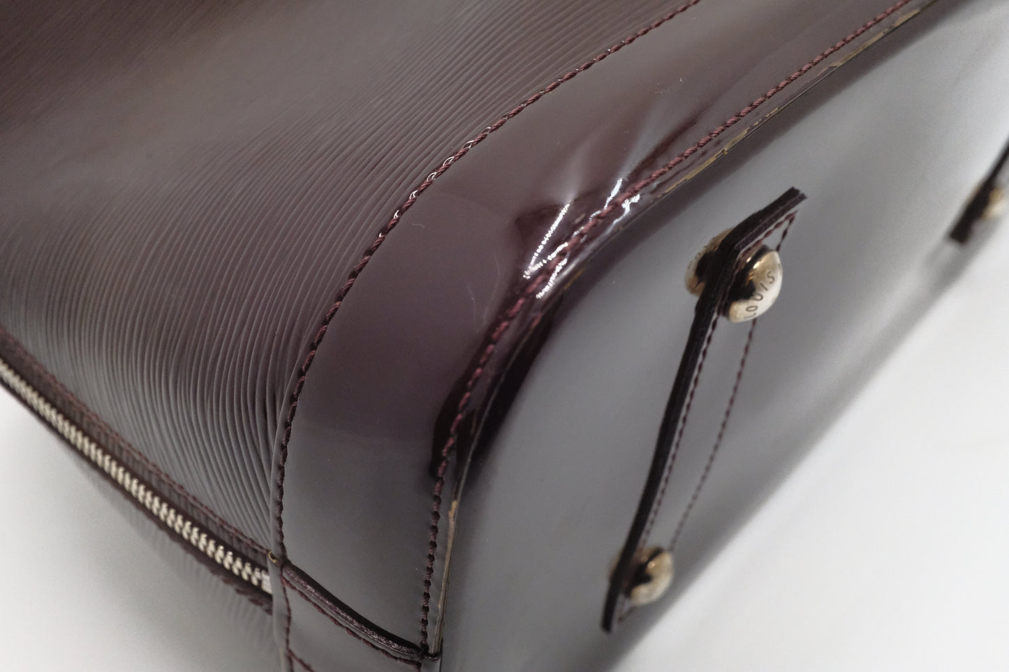 Louis Vuitton Alma GM in Burgundy Electric Epi Leather