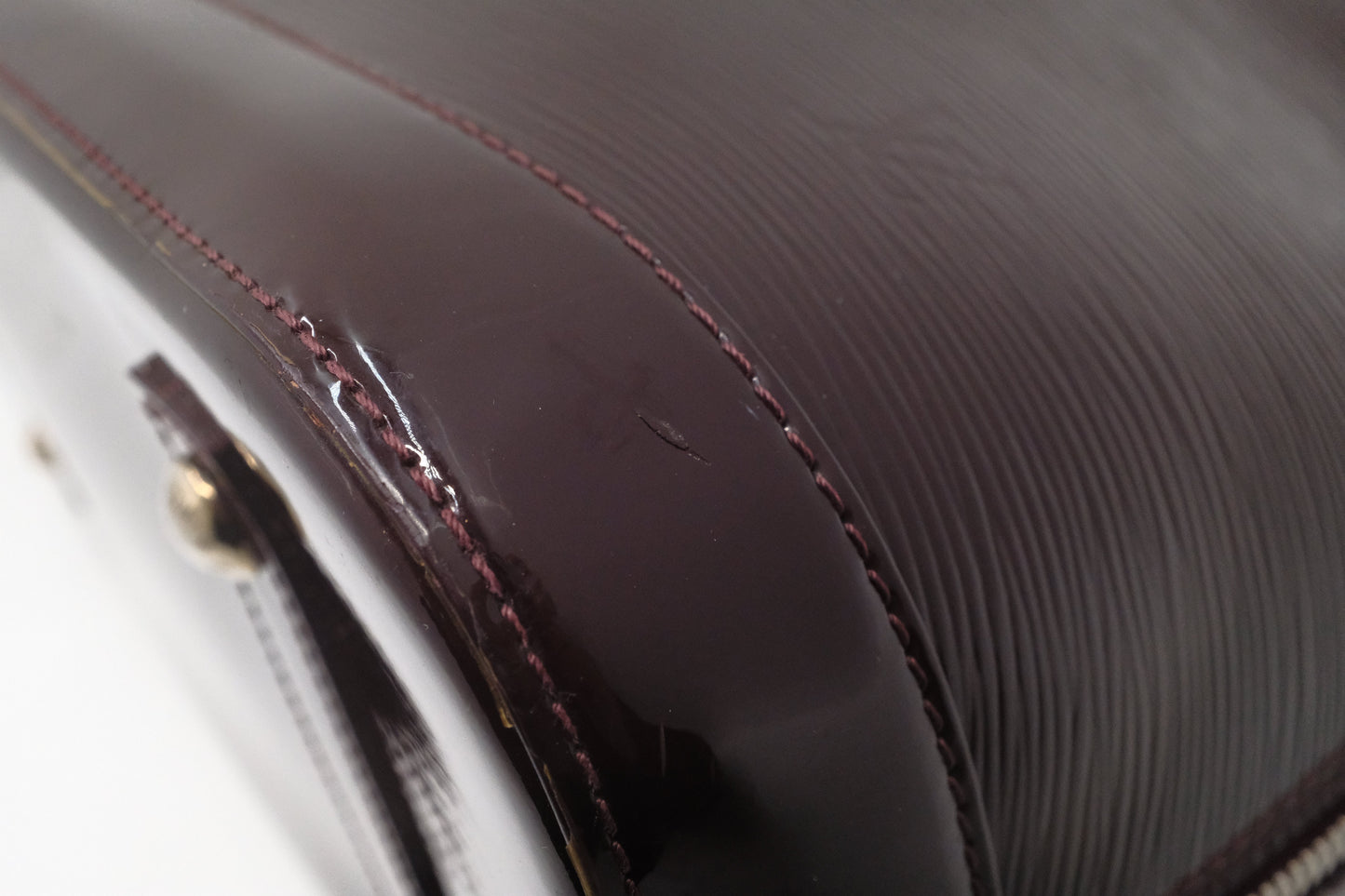 Louis Vuitton Alma GM in Burgundy Electric Epi Leather