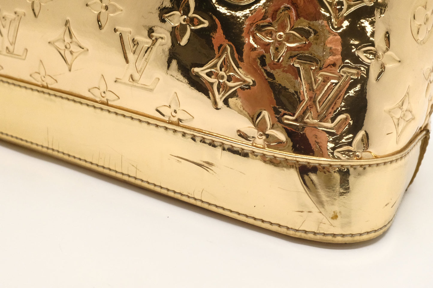 Louis Vuitton Alma GM in Gold Vernis Leather