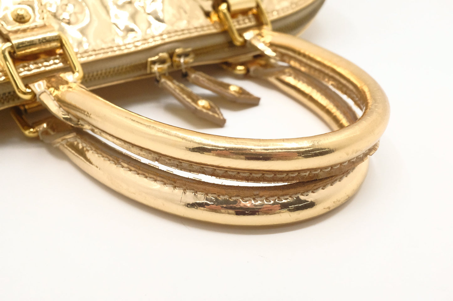 Louis Vuitton Alma GM in Gold Vernis Leather