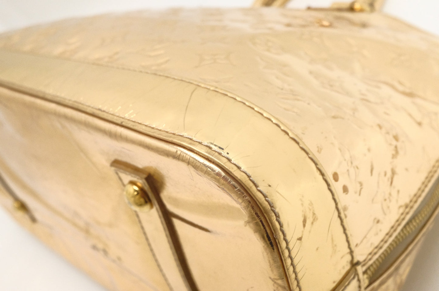 Louis Vuitton Alma GM in Gold Vernis Leather
