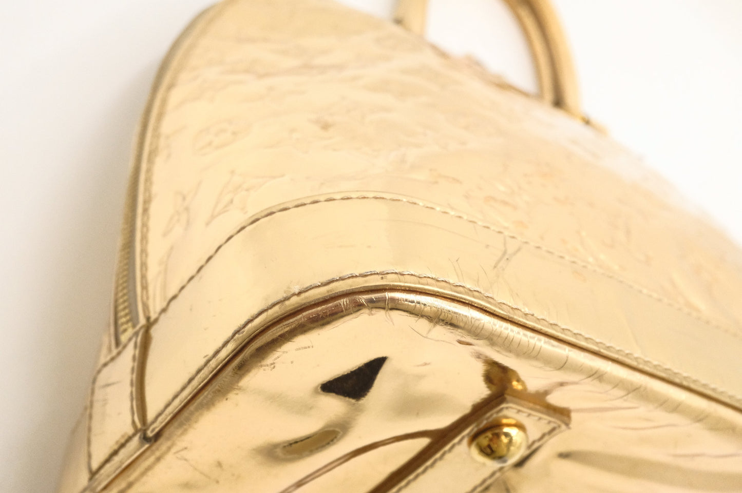 Louis Vuitton Alma GM in Gold Vernis Leather