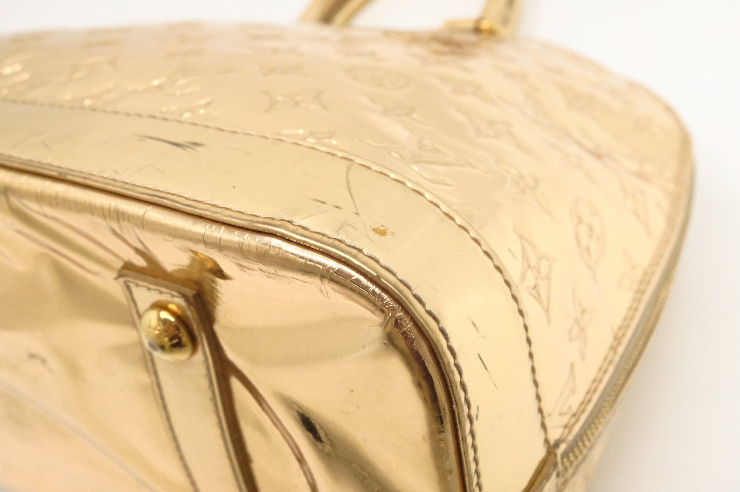 Louis Vuitton Alma GM in Gold Vernis Leather