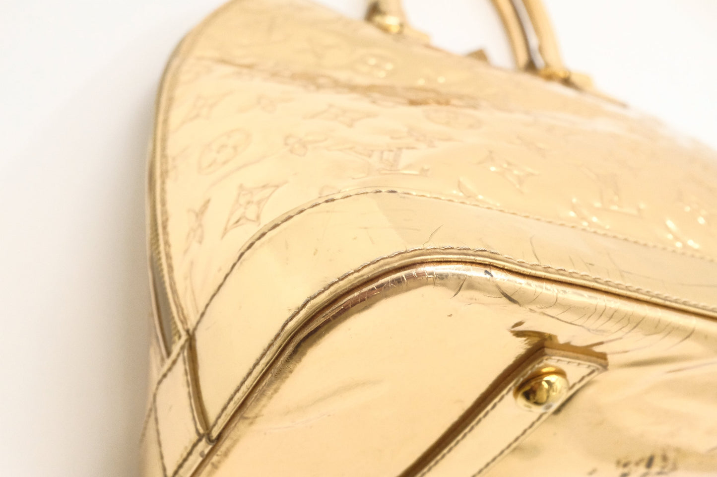Louis Vuitton Alma GM in Gold Vernis Leather