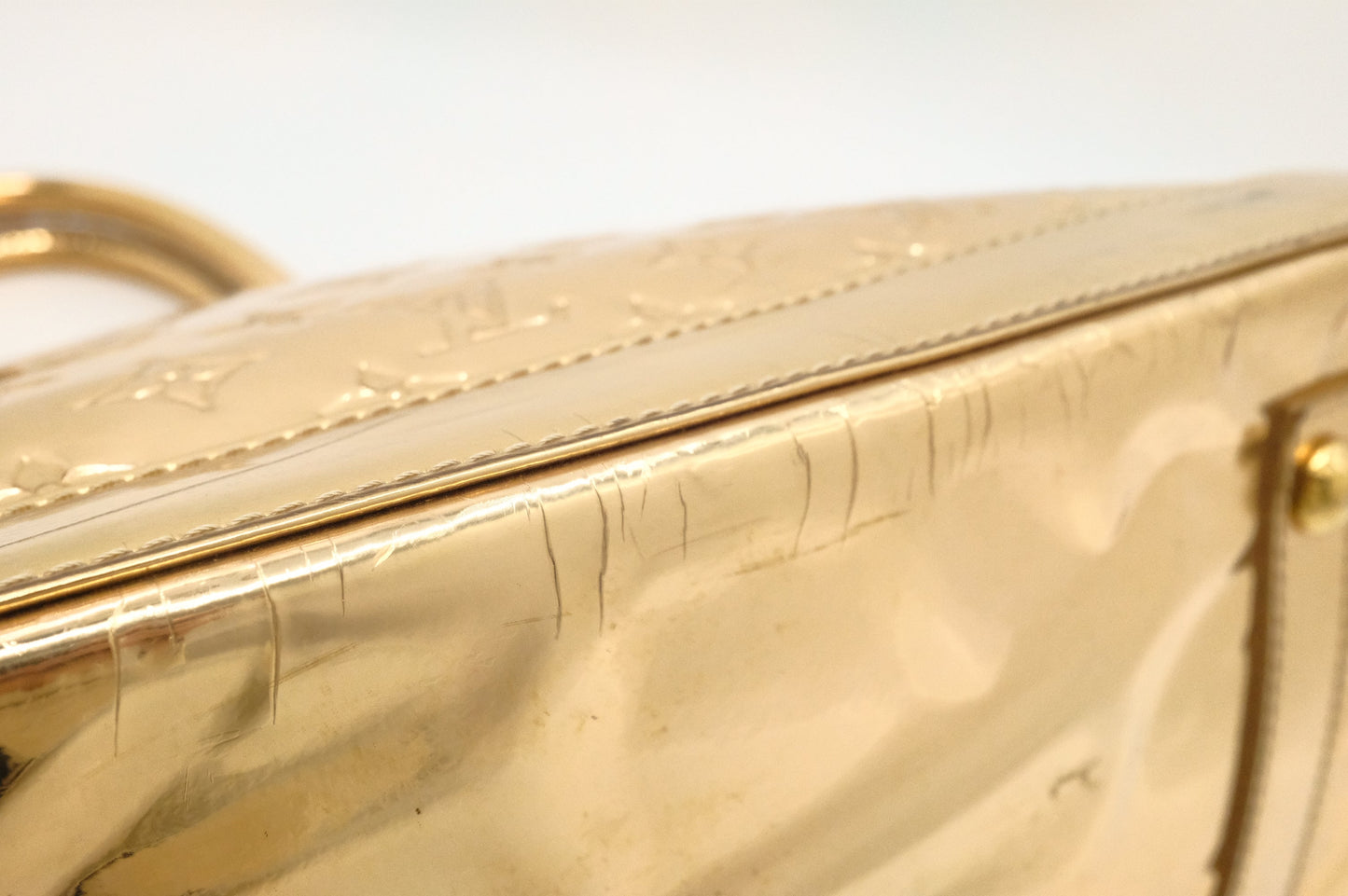 Louis Vuitton Alma GM in Gold Vernis Leather