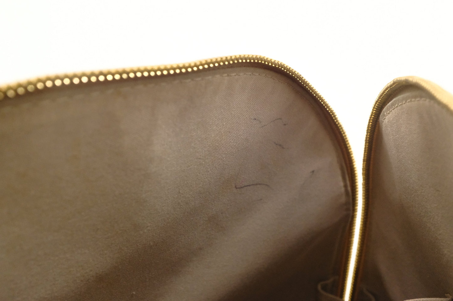 Louis Vuitton Alma GM in Gold Vernis Leather