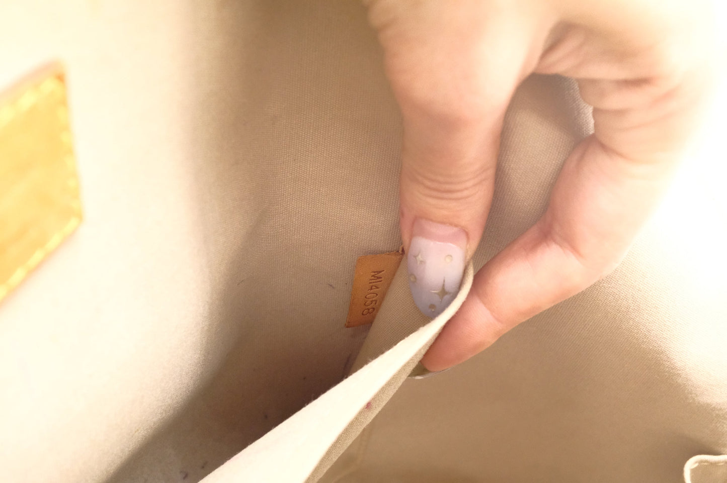 Louis Vuitton Alma GM in Gold Vernis Leather