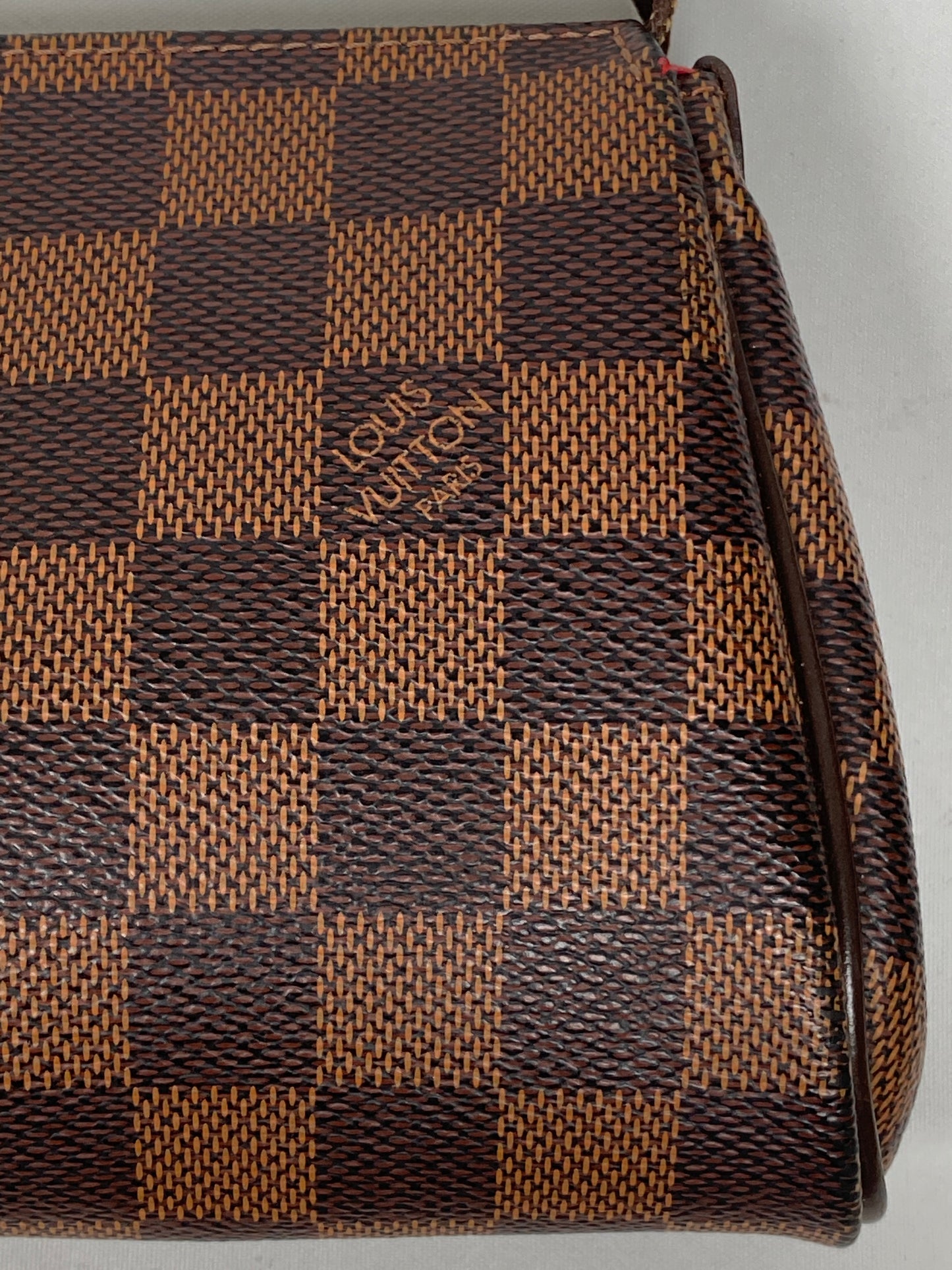 LOUIS VUITTON - EVA CLUTCH IN DAMIER EBENE