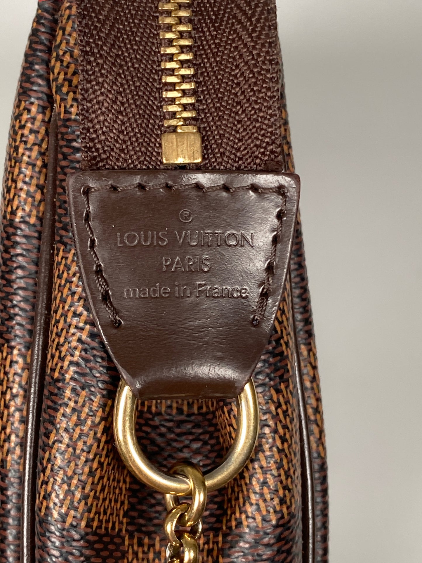 LOUIS VUITTON - EVA CLUTCH IN DAMIER EBENE