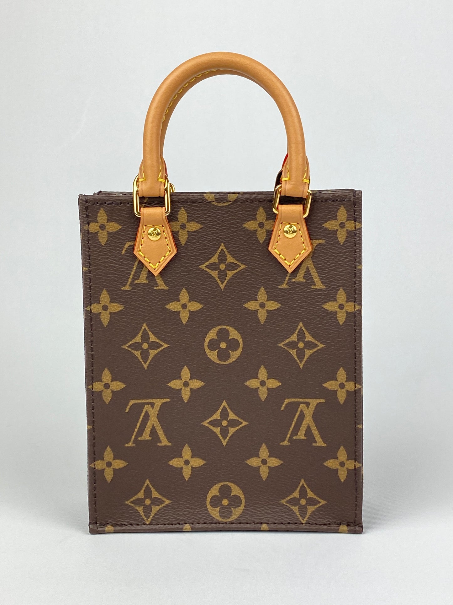 LOUIS VUITTON - PETIT SAC PLAT IN MONOGRAM CANVAS