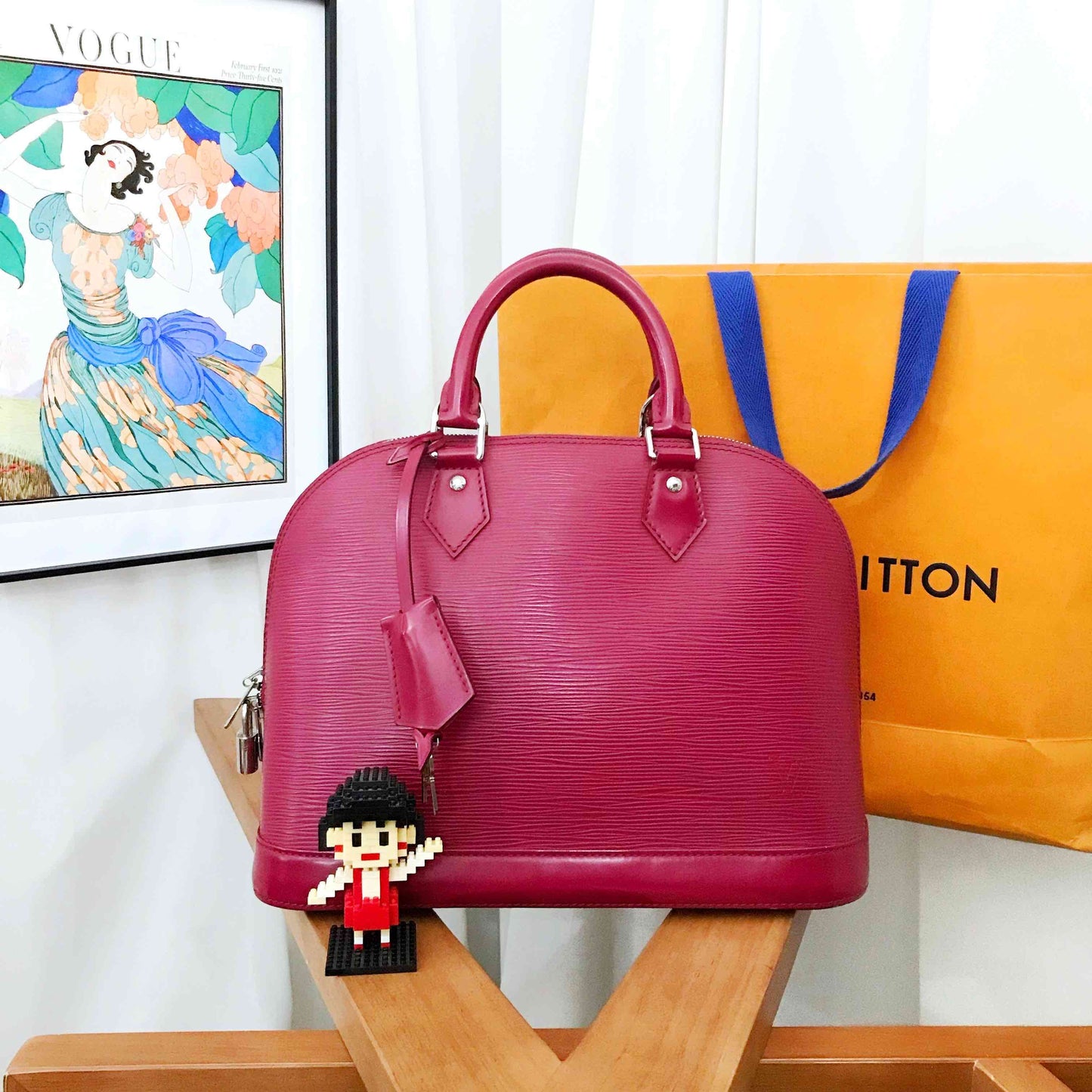 Louis Vuitton Epi Alma PM Raspberry Leather Handbag