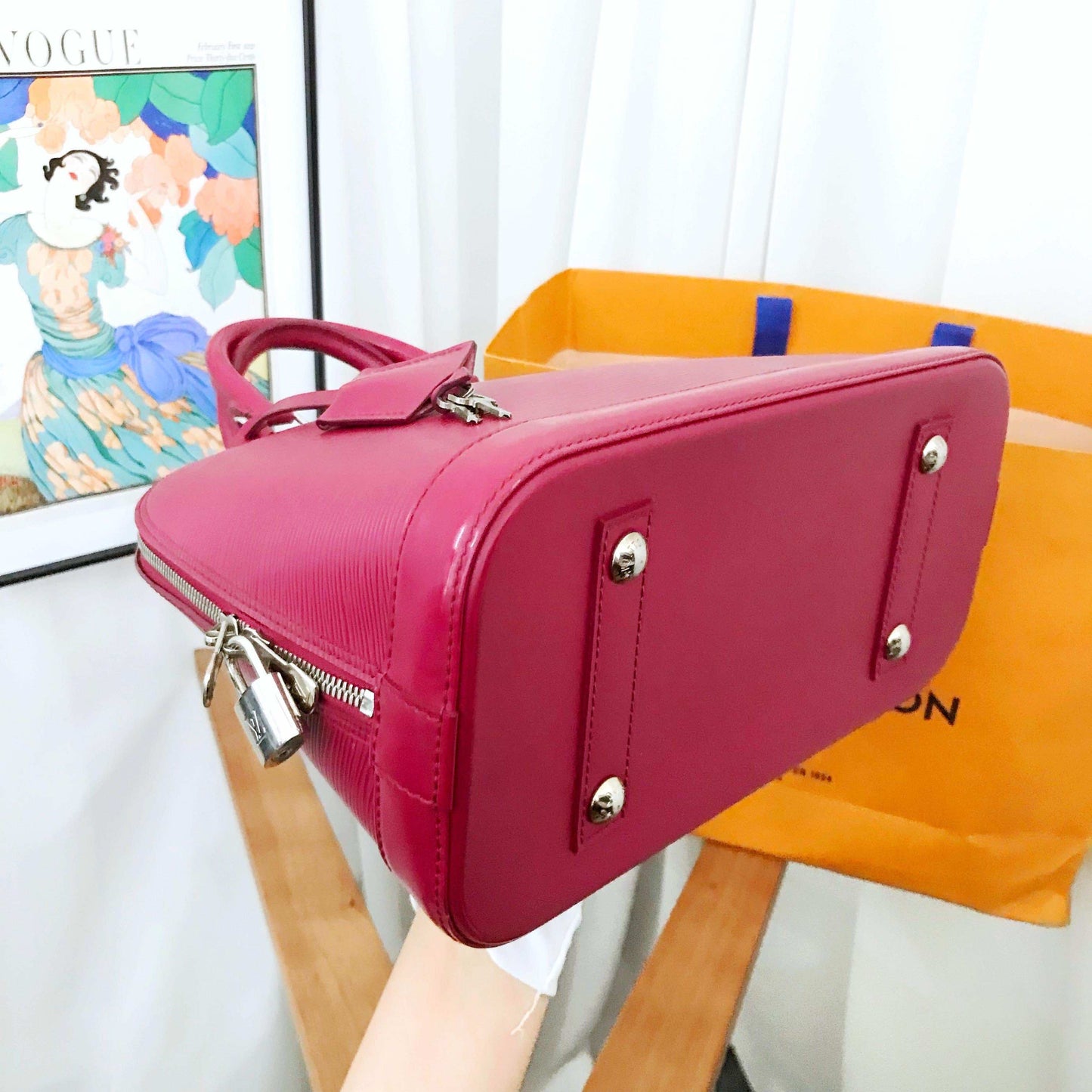 Louis Vuitton Epi Alma PM Raspberry Leather Handbag