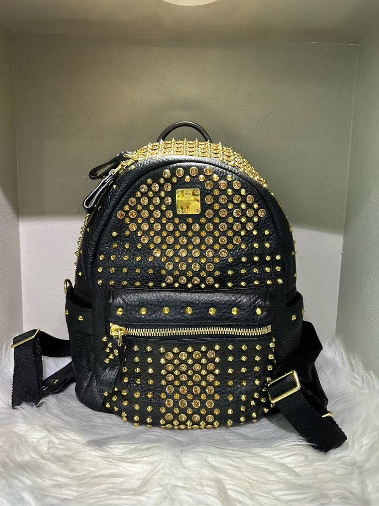 MCM Stark Studded Black Leather Pre-loved Backpack
