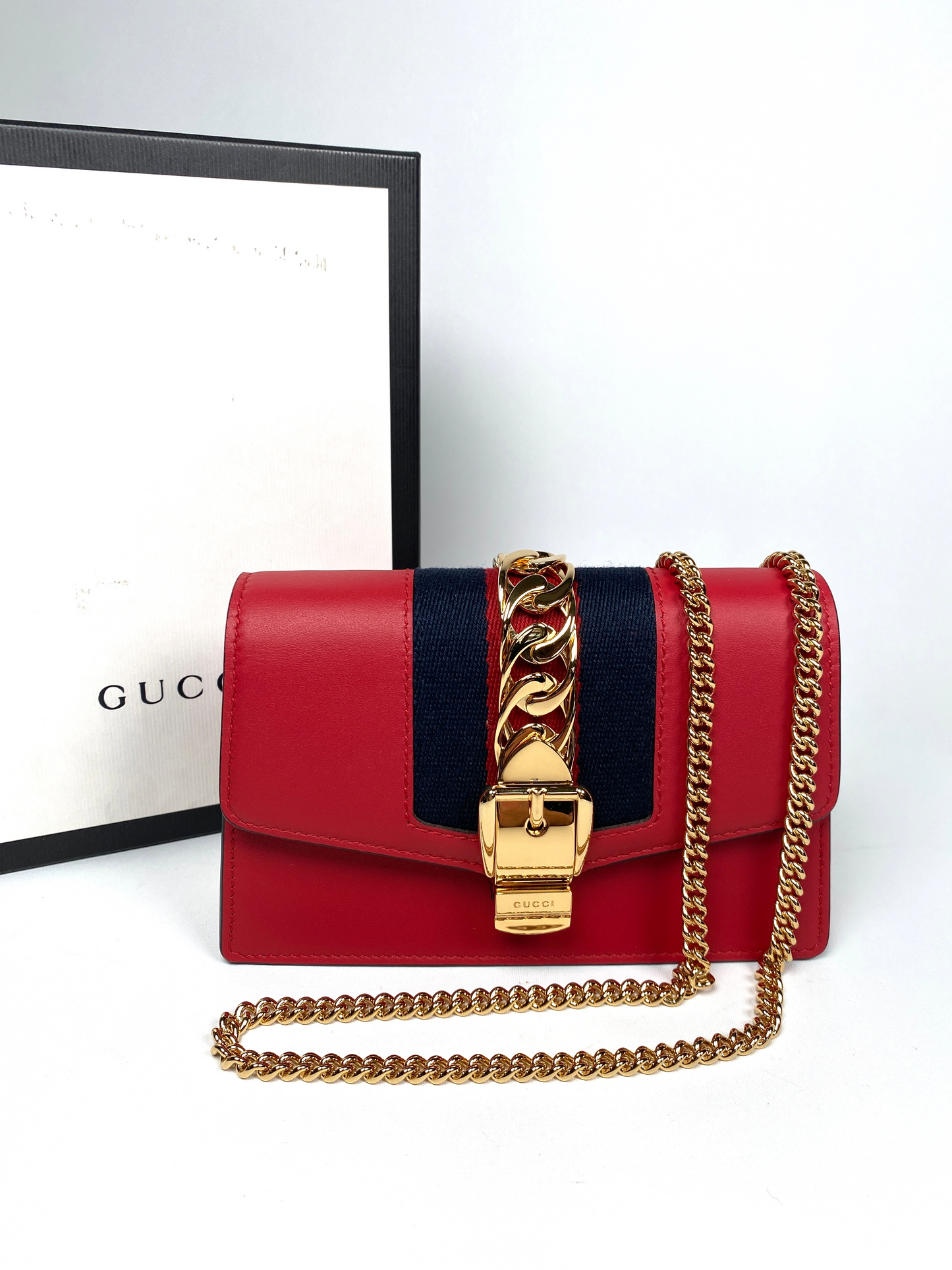 GUCCI - MINI SYLVIE LEATHER CHAIN BAG IN RED