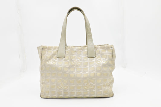 Chanel New Travel Line Tote in Champagne Canvas