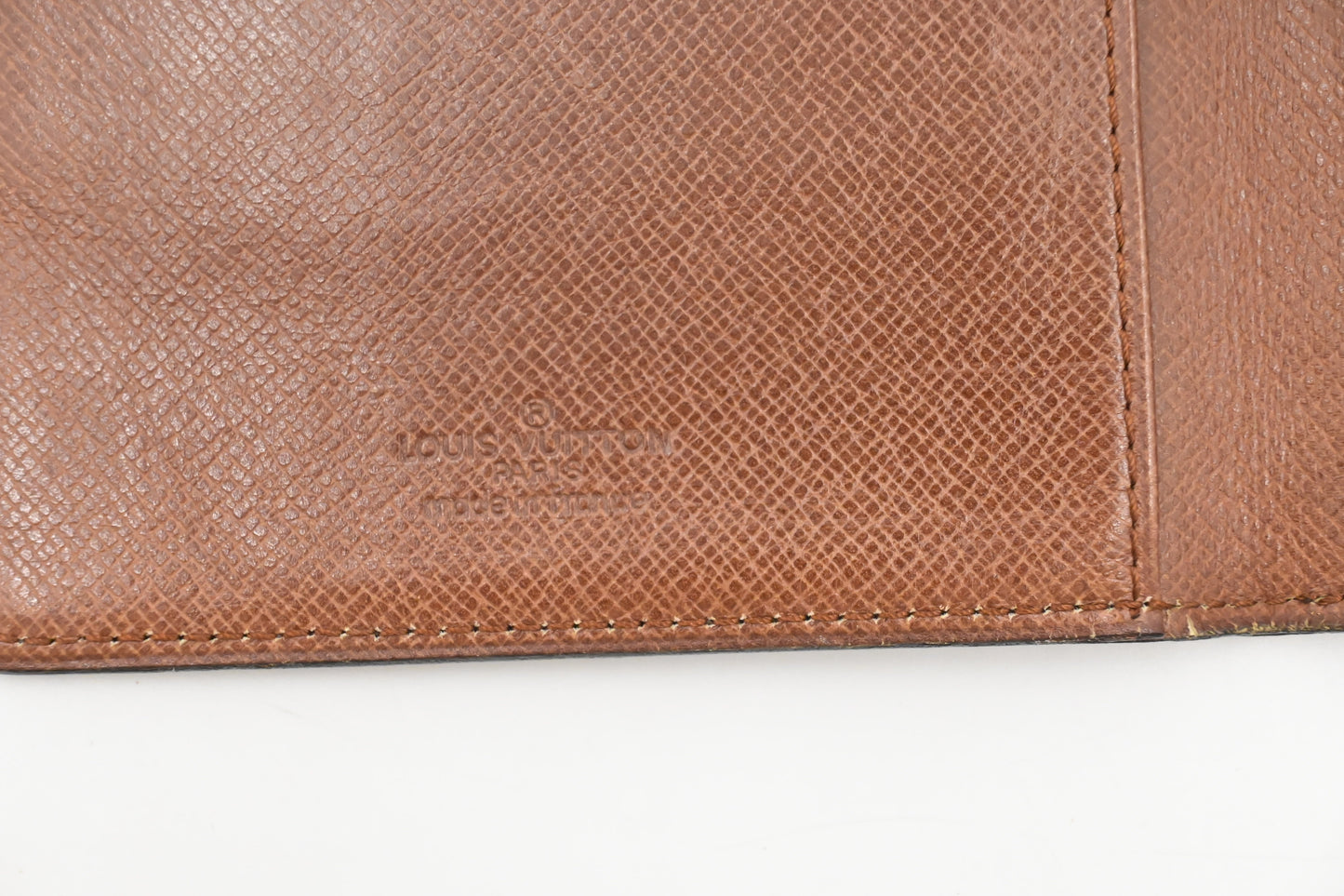 Louis Vuitton Vertical Bifold Wallet in Monogram Canvas