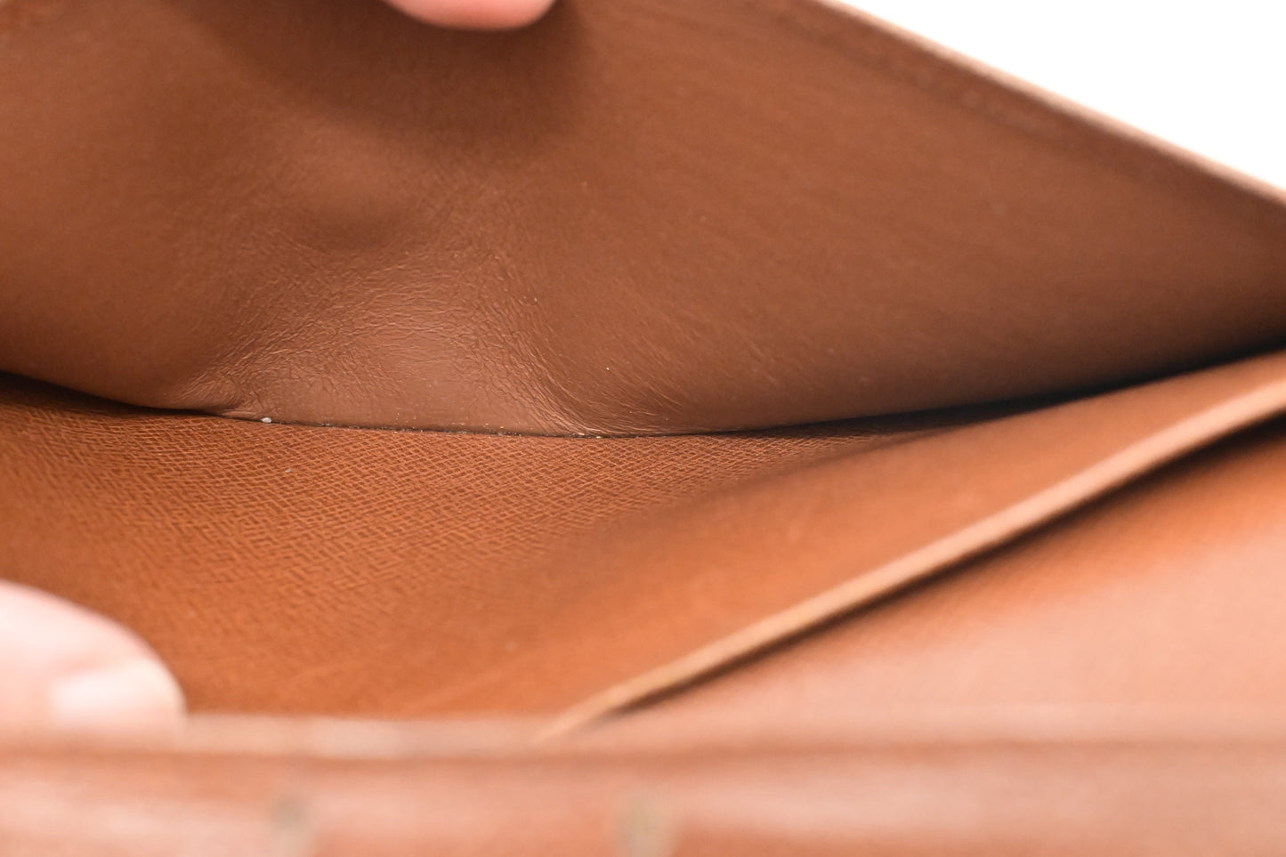 Louis Vuitton Vertical Bifold Wallet in Monogram Canvas