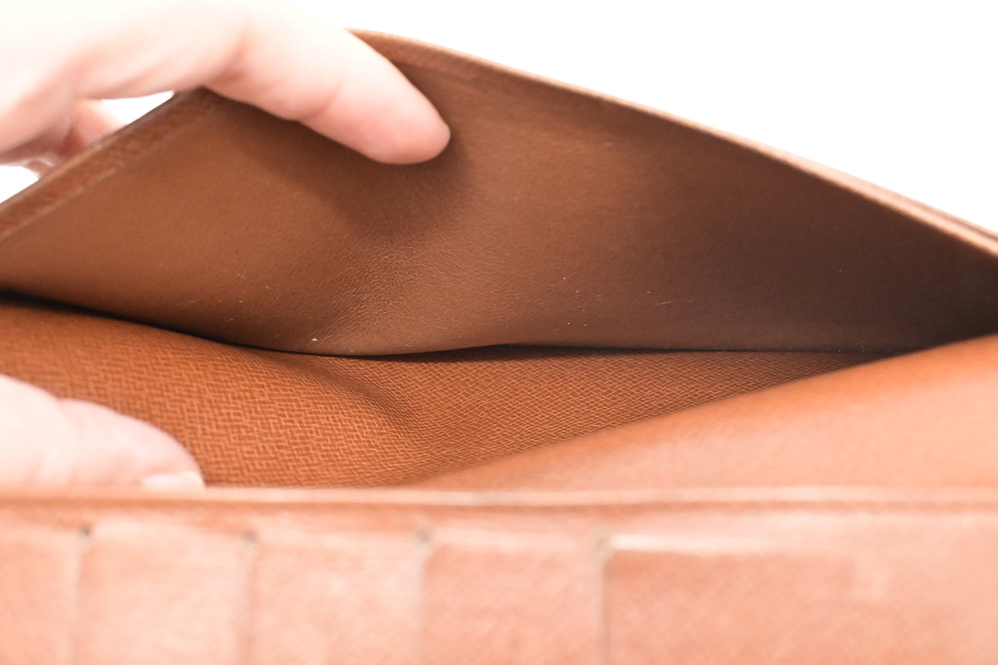 Louis Vuitton Vertical Bifold Wallet in Monogram Canvas