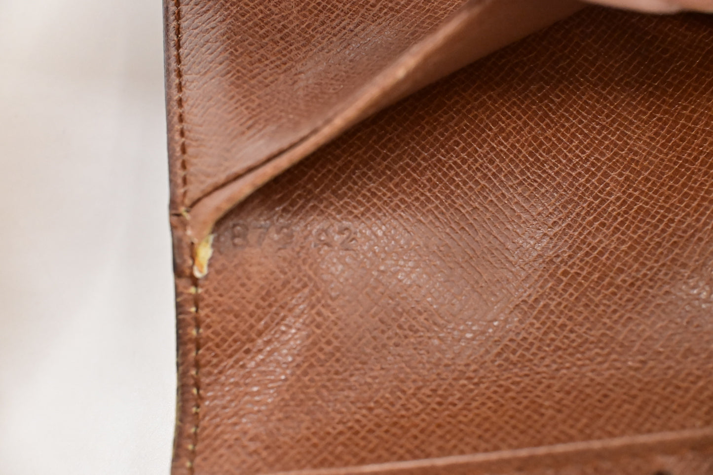 Louis Vuitton Vertical Bifold Wallet in Monogram Canvas