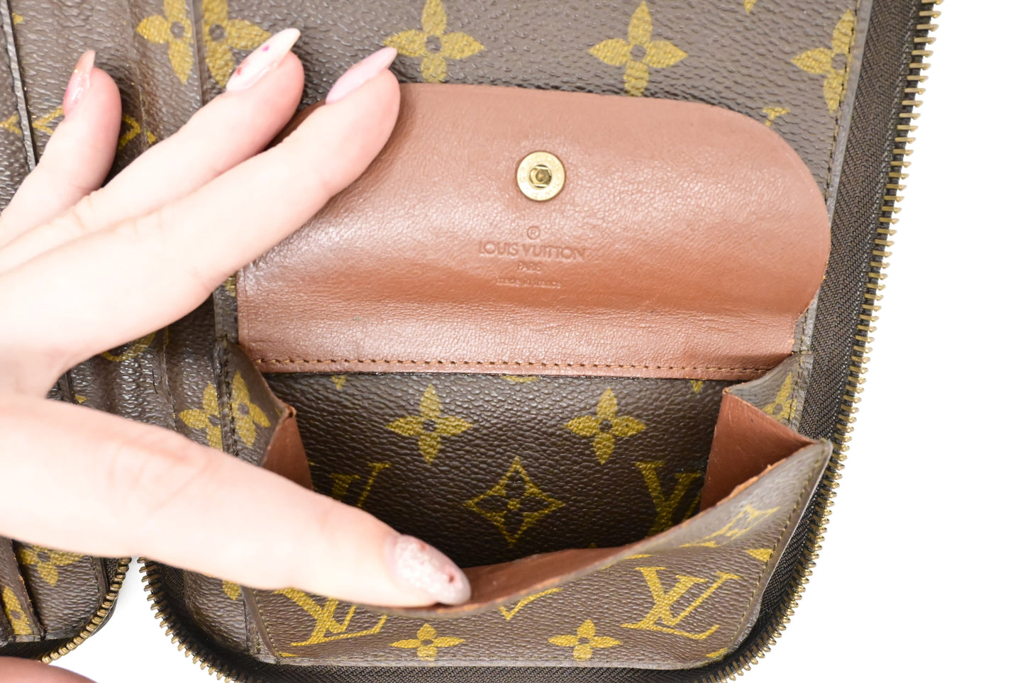 Louis Vuitton Poche Escapade in Monogram Canvas