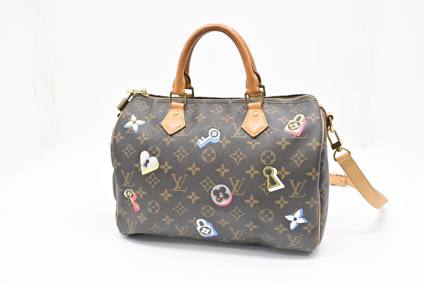 Louis Vuitton Speedy 30 Bandouliere in Love Lock Monogram Canvas