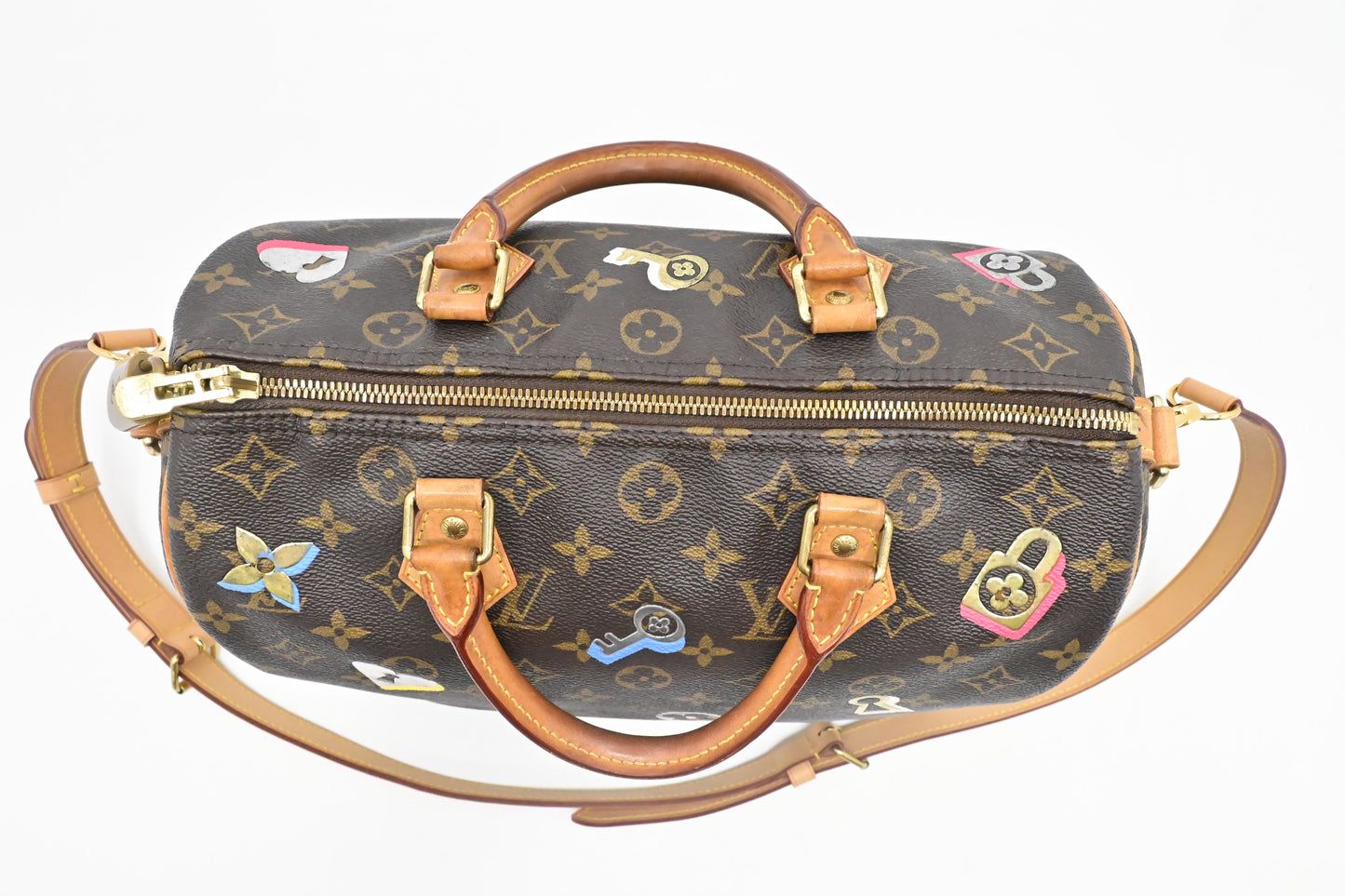 Louis Vuitton Speedy 30 Bandouliere in Love Lock Monogram Canvas