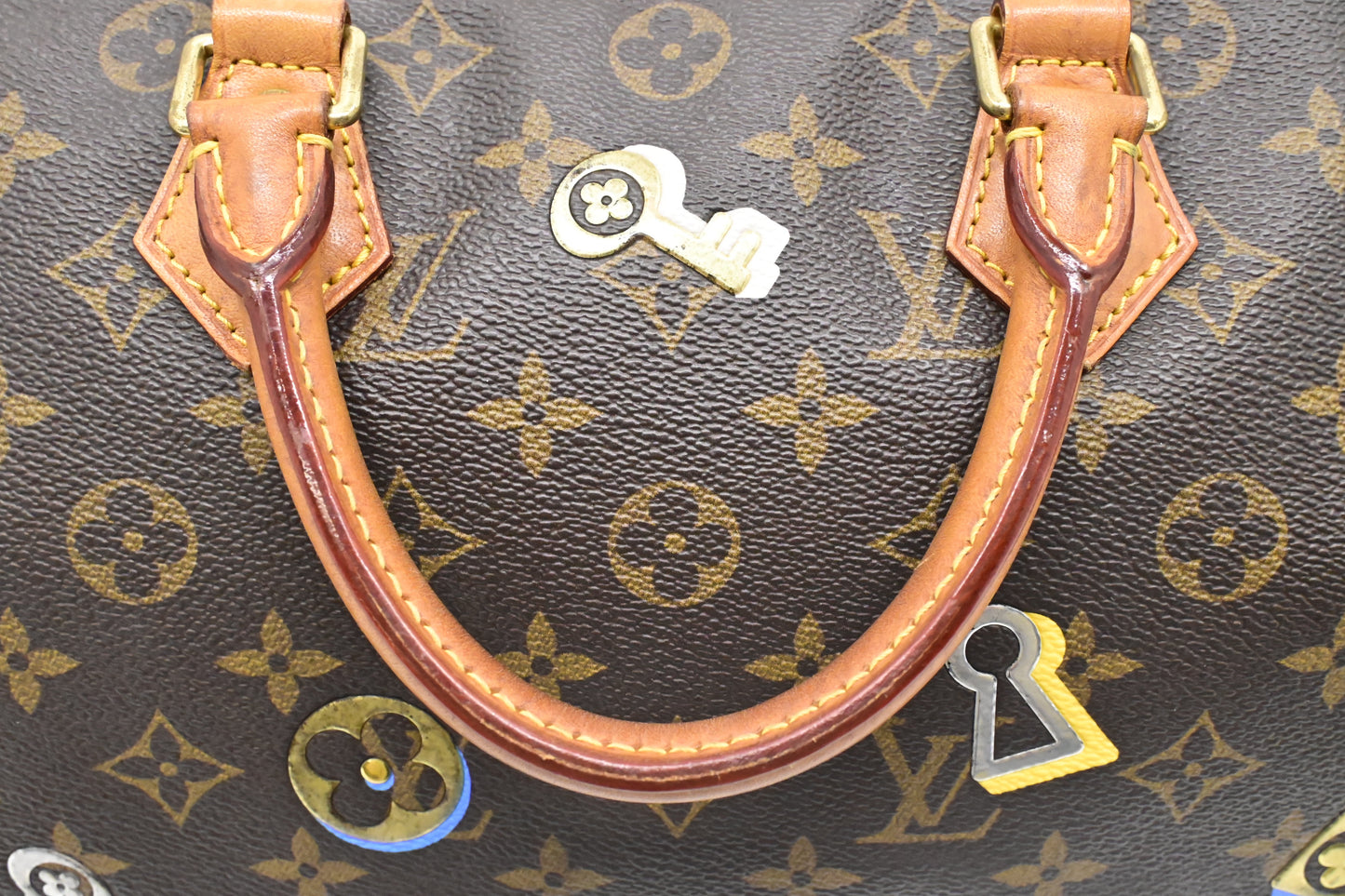 Louis Vuitton Speedy 30 Bandouliere in Love Lock Monogram Canvas