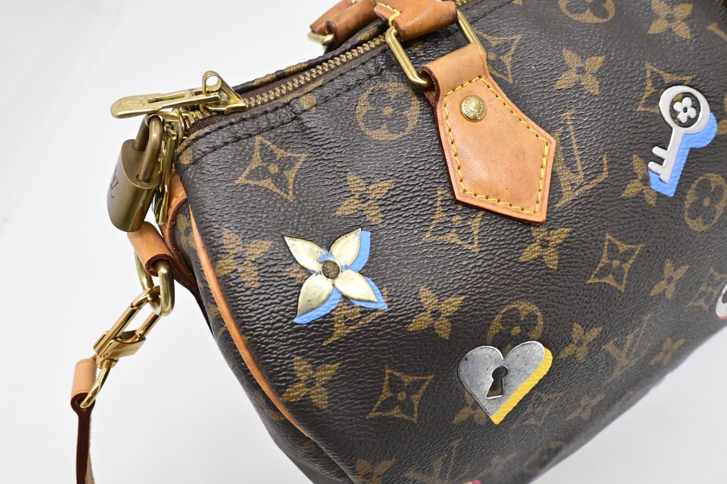Louis Vuitton Speedy 30 Bandouliere in Love Lock Monogram Canvas