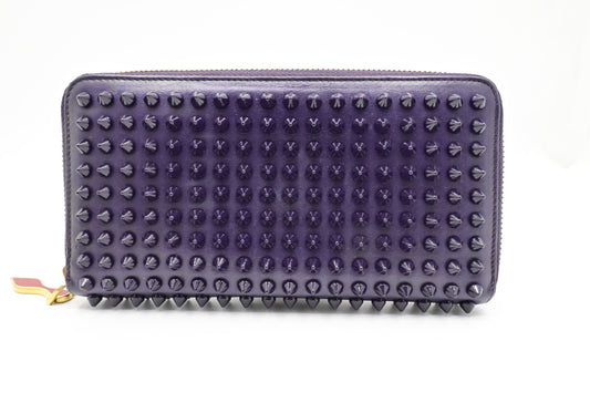 Louboutin Zippy Wallet in Spiked Purple Leather
