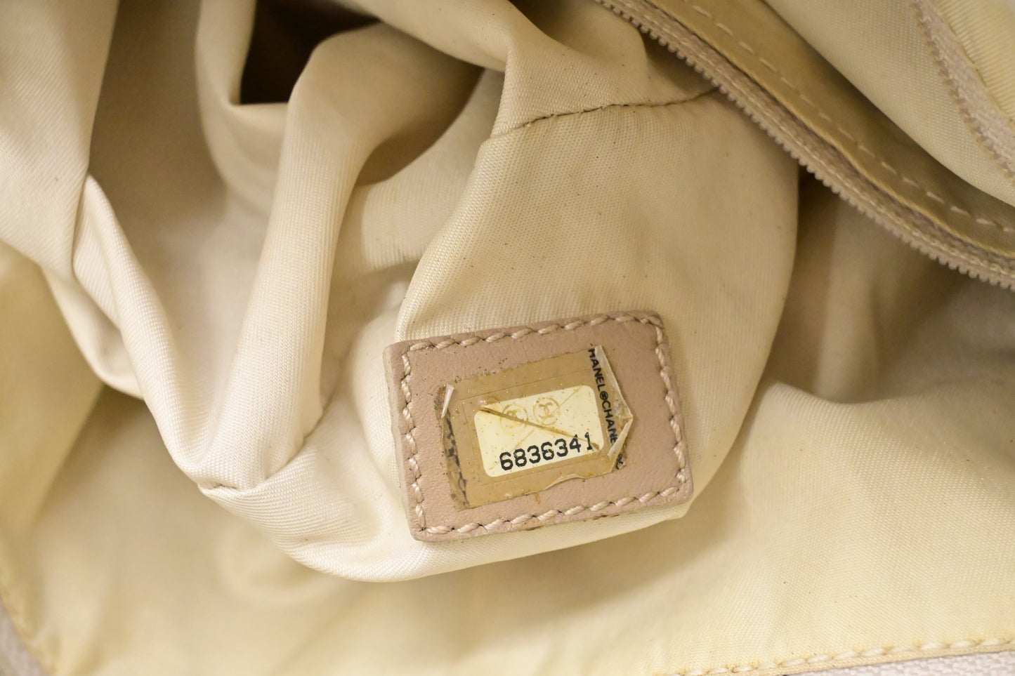 Chanel New Travel Line Zip Tote in Champagne Canvas