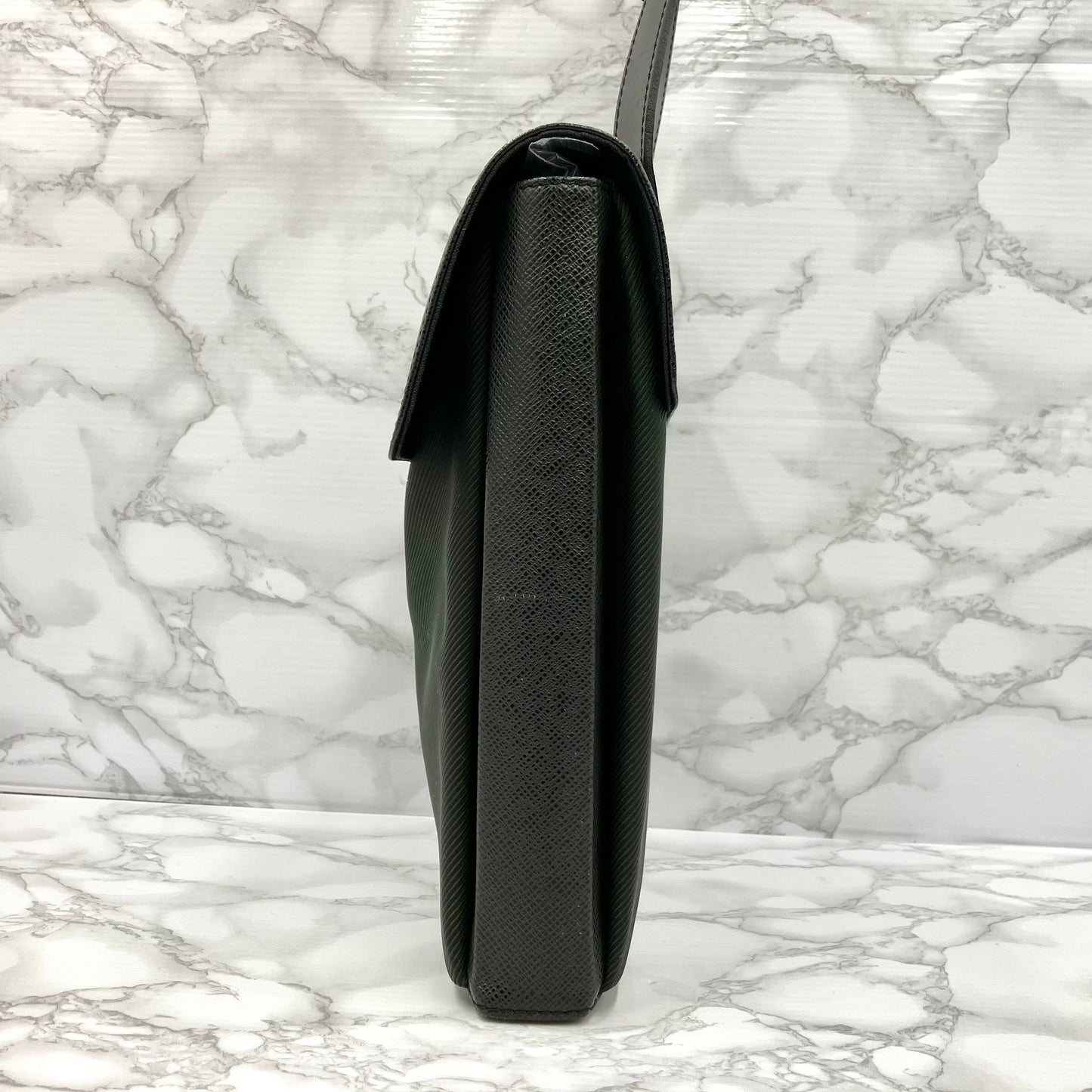 Louis Vuitton  Taiga Shoulder Bag