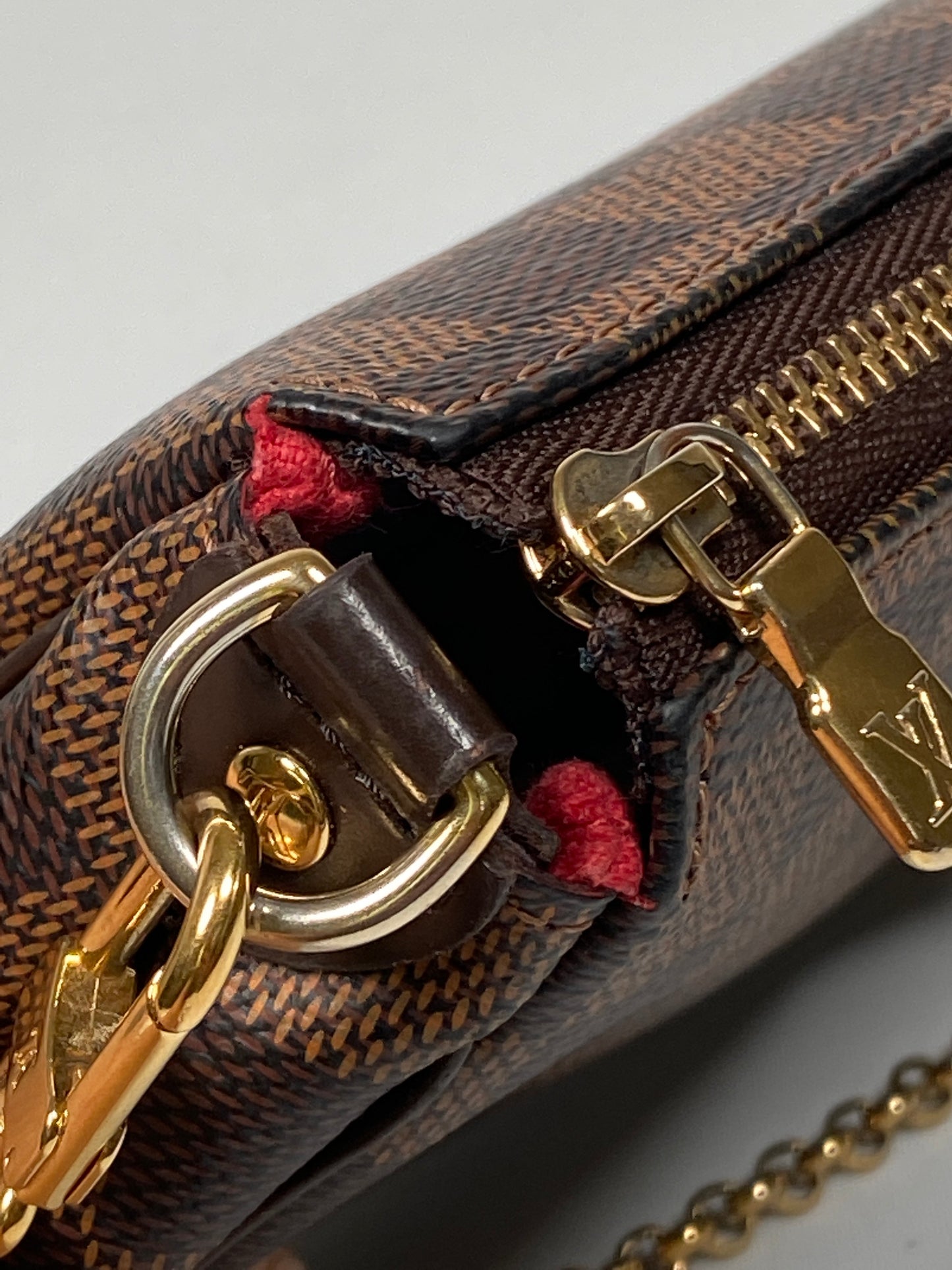 LOUIS VUITTON - EVA CLUTCH IN DAMIER EBENE