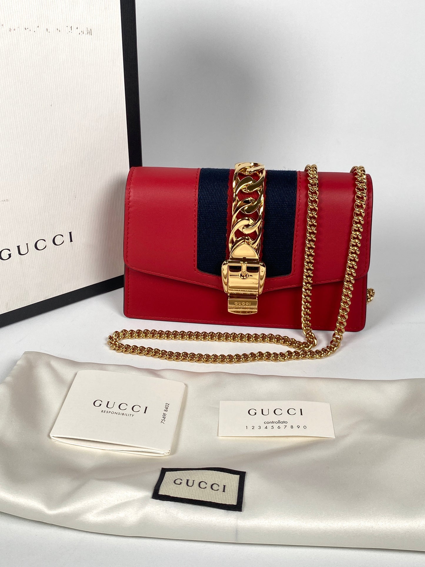 GUCCI - MINI SYLVIE LEATHER CHAIN BAG IN RED