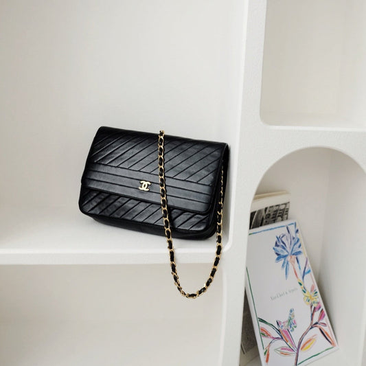 Chanel cc logo chain shoulder bag leather black gold