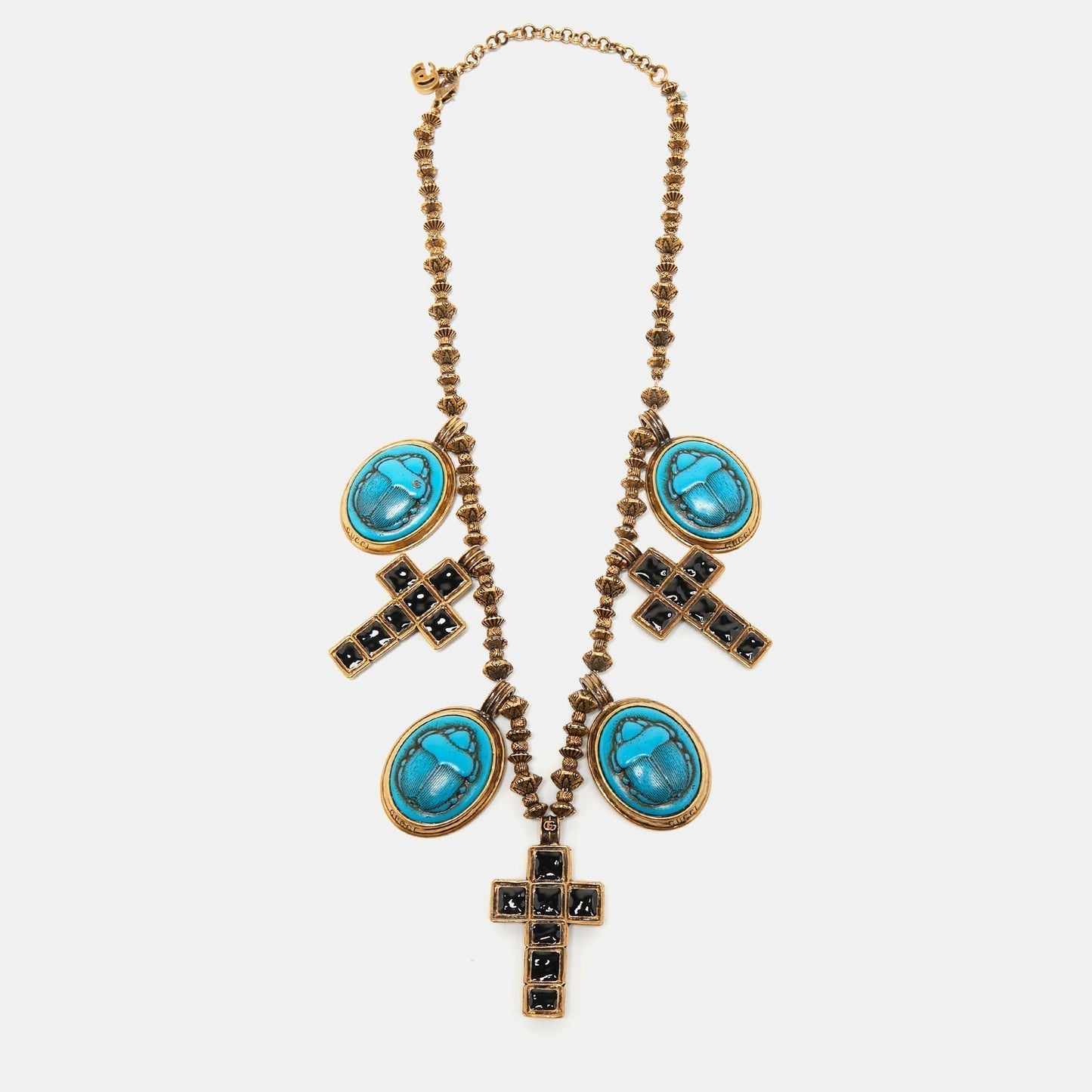 Gucci Aged Gold Tone Scarab and Cross Charms Necklace