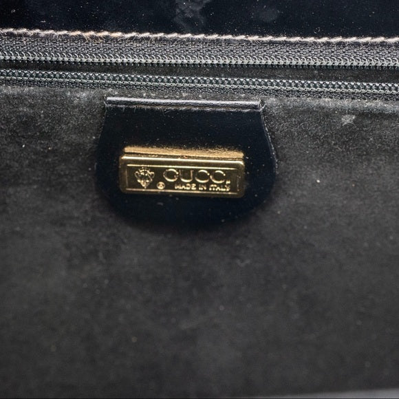GUCCI vintage black leather clutch