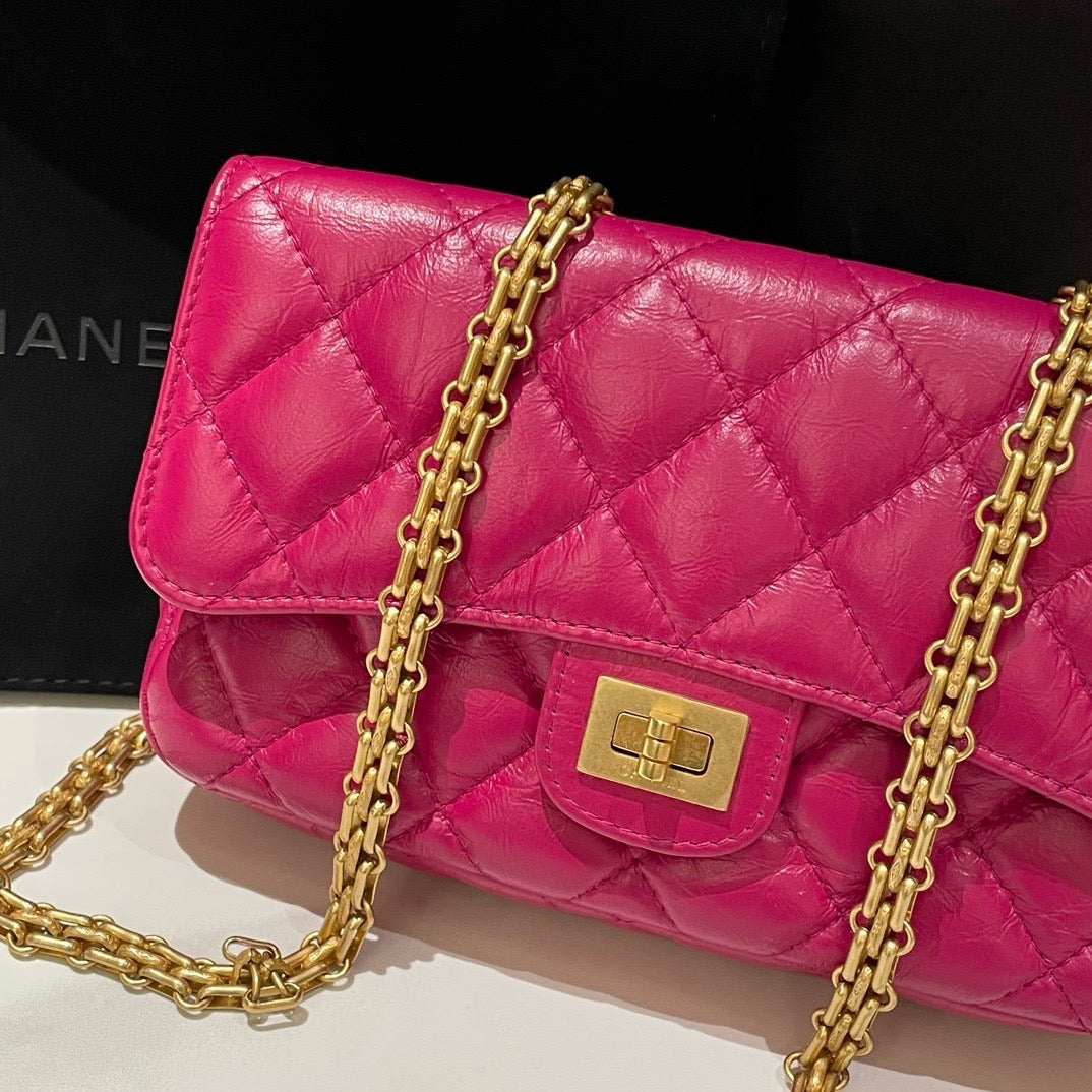 Chanel . Mini Pink Leather Quilted Chain Shoulder Bag