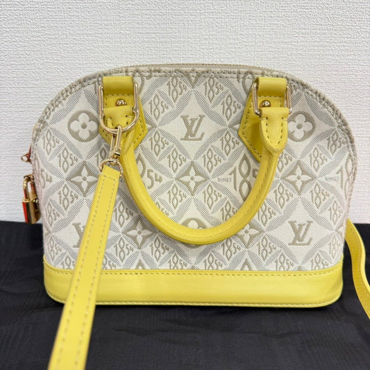 Louis Vuitton Since 1854 Alma BB 2way Bag Yellow Canvas Top Handle Mini